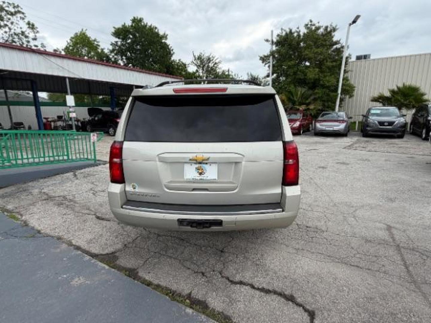 2015 CASHMERE METALLIC /brown Chevrolet Suburban LTZ 1500 4WD (1GNSKKKC4FR) with an 5.3L V8 OHV 16V engine, 6-Speed Automatic transmission, located at 4545 Spencer Hwy., Pasadena, 77504, (832) 266-1645, 29.666037, -95.173775 - Photo#3