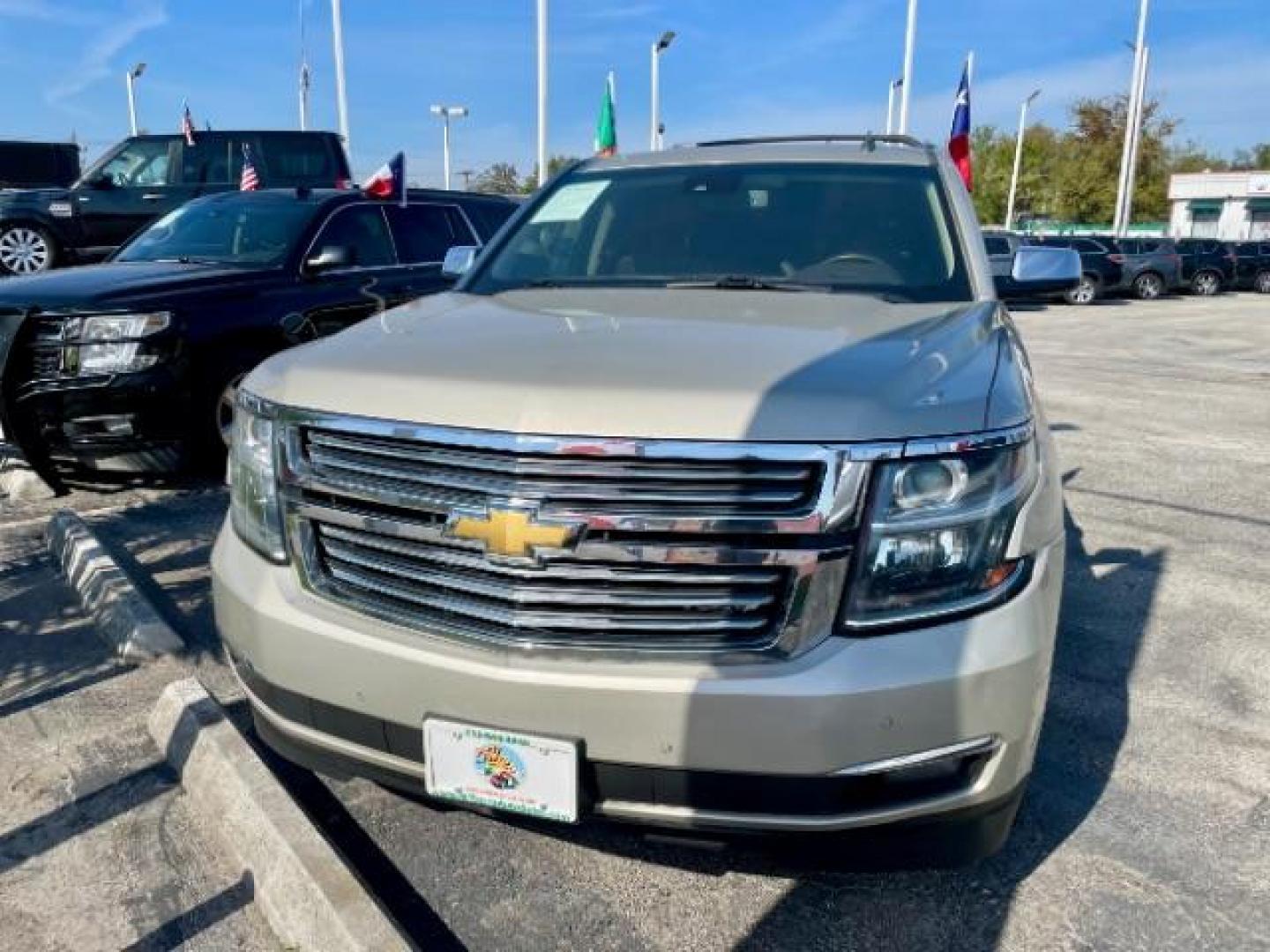 2015 CASHMERE METALLIC /brown Chevrolet Suburban LTZ 1500 4WD (1GNSKKKC4FR) with an 5.3L V8 OHV 16V engine, 6-Speed Automatic transmission, located at 4545 Spencer Hwy., Pasadena, 77504, (832) 266-1645, 29.666037, -95.173775 - Photo#0