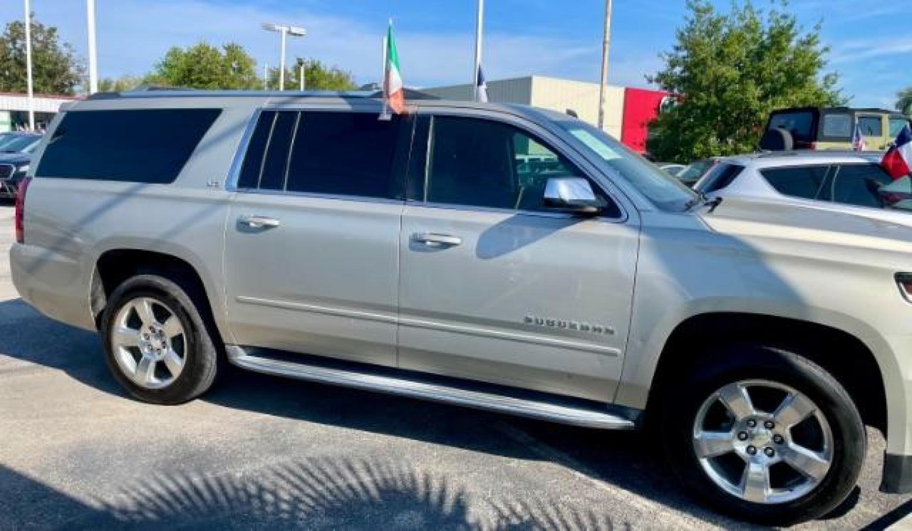 2015 CASHMERE METALLIC /brown Chevrolet Suburban LTZ 1500 4WD (1GNSKKKC4FR) with an 5.3L V8 OHV 16V engine, 6-Speed Automatic transmission, located at 4545 Spencer Hwy., Pasadena, 77504, (832) 266-1645, 29.666037, -95.173775 - Photo#3