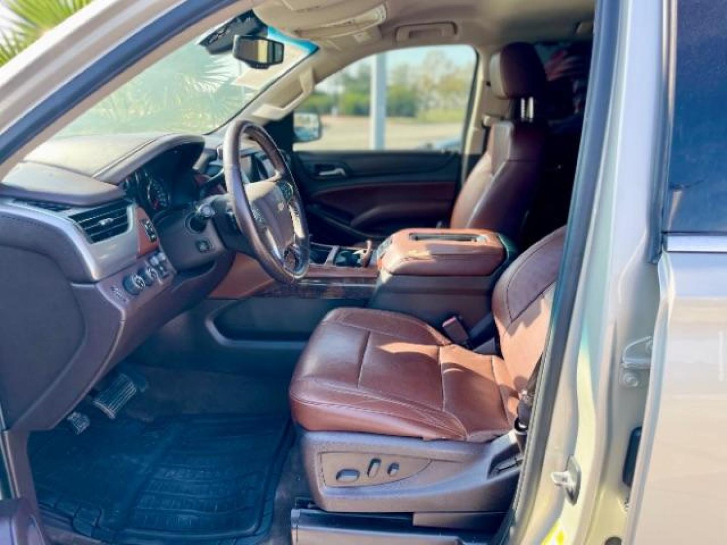 2015 CASHMERE METALLIC /brown Chevrolet Suburban LTZ 1500 4WD (1GNSKKKC4FR) with an 5.3L V8 OHV 16V engine, 6-Speed Automatic transmission, located at 4545 Spencer Hwy., Pasadena, 77504, (832) 266-1645, 29.666037, -95.173775 - Photo#5