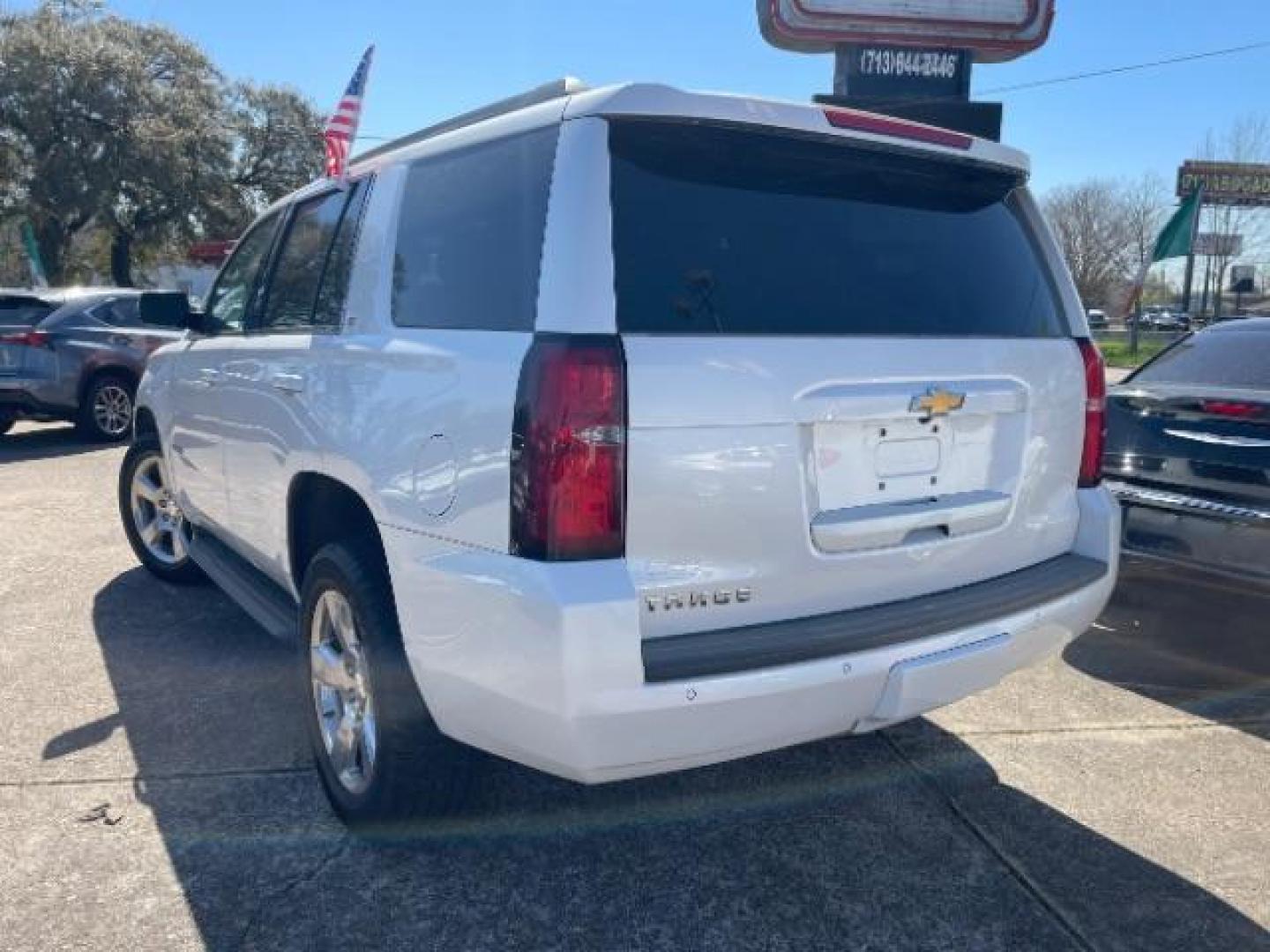 2018 Summit White Chevrolet Tahoe LT 2WD (1GNSCBKC8JR) with an 5.3L V8 OHV 16V engine, 6-Speed Automatic transmission, located at 7935 Gulf Freeway, Houston, 77017, (832) 266-1645, 29.684393, -95.275665 - Photo#4