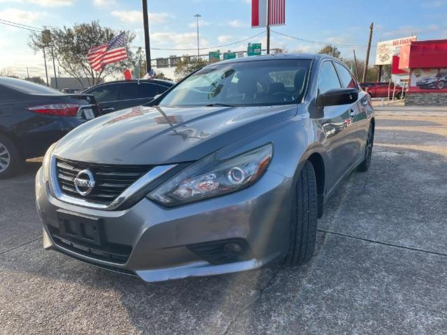 2017 Gun Metallic Nissan Altima 2.5 SR (1N4AL3AP2HC) with an 2.5L L4 DOHC 16V engine, Continuously Variable Transmission transmission, located at 7935 Gulf Freeway, Houston, 77017, (832) 266-1645, 29.684393, -95.275665 - Photo#2