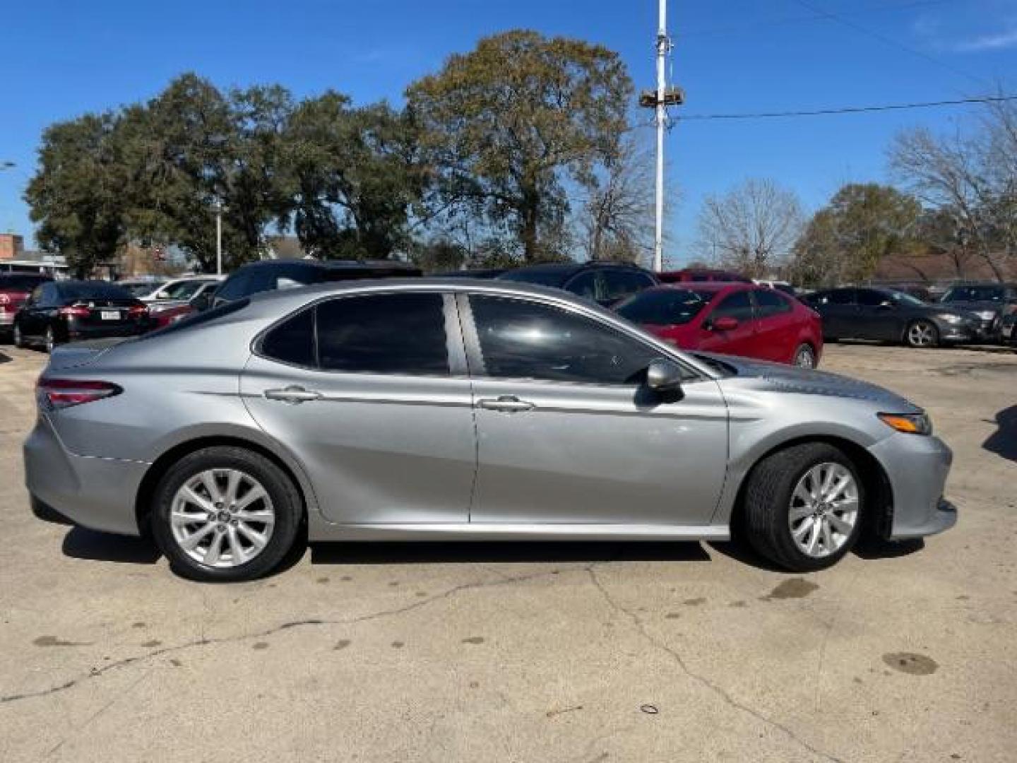 2019 Celestial Silver Metallic Toyota Camry LE (4T1B11HK7KU) with an 2.5L L4 DOHC 16V engine, 8-Speed Automatic transmission, located at 7935 Gulf Freeway, Houston, 77017, (832) 266-1645, 29.684393, -95.275665 - Photo#7