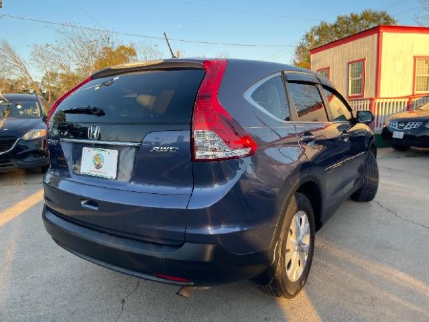 2014 Twilight Blue Metallic /Gray Honda CR-V EX (2HKRM4H52EH) with an 2.4L I-4 DOHC engine, AUTOMATIC transmission, located at 7935 Gulf Freeway, Houston, 77017, (832) 266-1645, 29.684393, -95.275665 - Photo#6