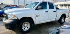 2019 White /Gray Ram 1500 Tradesman Quad Cab (1C6RR6FG4KS) with an 3.6L Pentastar V6 wi engine, 8-speed automatic transmission, located at 4545 Spencer Hwy., Pasadena, 77504, (832) 266-1645, 29.666037, -95.173775 - Photo#0