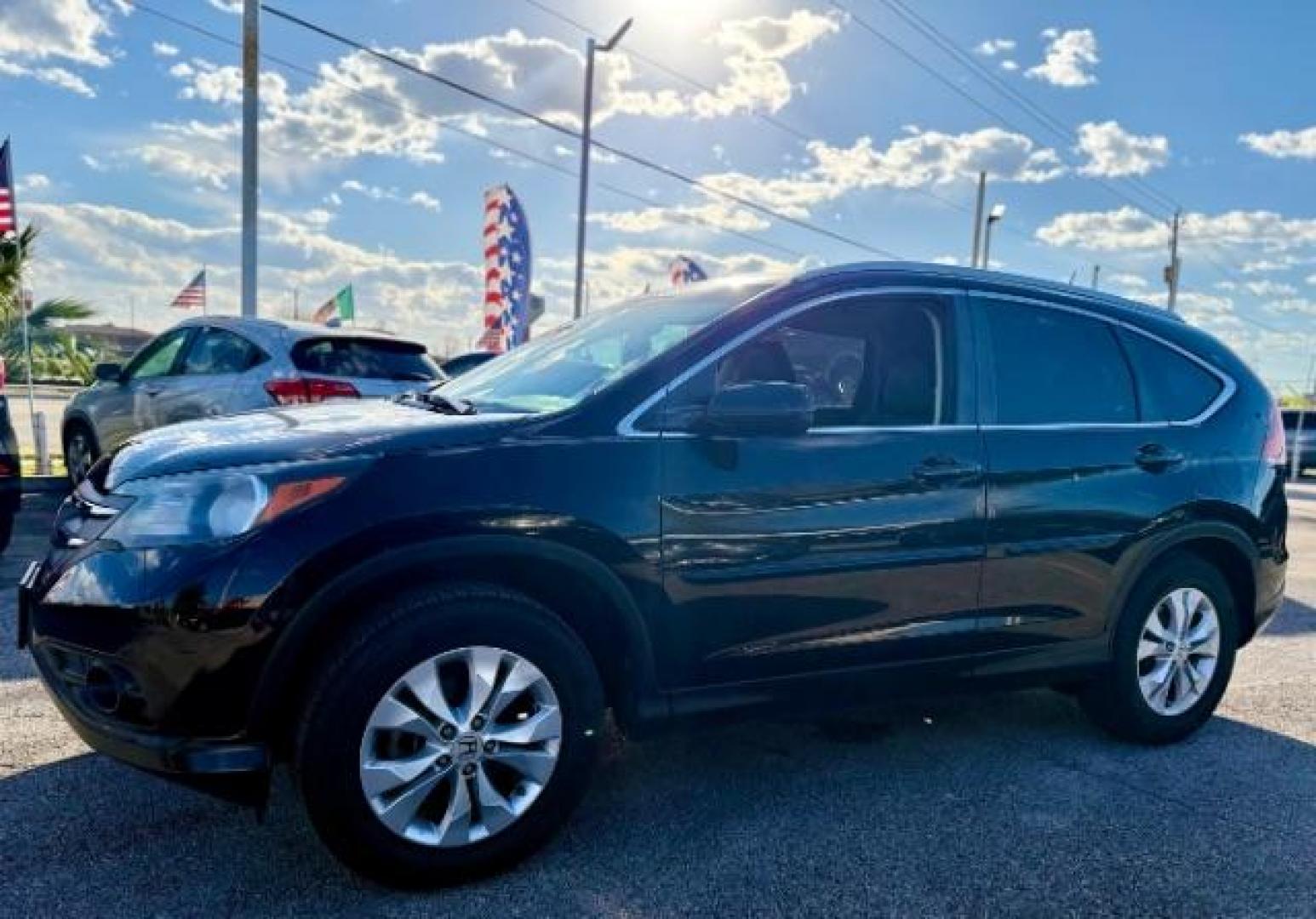 2014 Black /Black Honda CR-V EX-L (2HKRM3H71EH) with an 2.4L 4-Cylinder engine, 5-Speed automatic transmission, located at 4545 Spencer Hwy., Pasadena, 77504, (832) 266-1645, 29.666037, -95.173775 - Photo#2