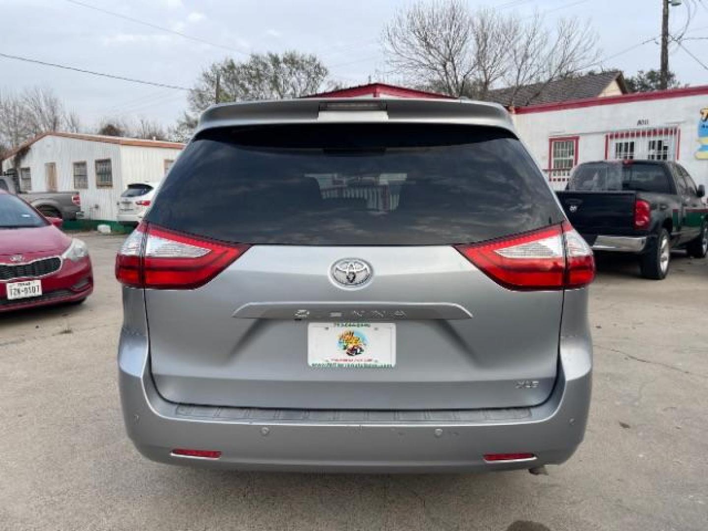 2015 Silver Sky Metallic Toyota Sienna XLE Premium Minivan 4D (5TDYK3DC1FS) with an V6, 3.5 Liter engine, Automatic, 6-Spd transmission, located at 7935 Gulf Freeway, Houston, 77017, (832) 266-1645, 29.684393, -95.275665 - Photo#5