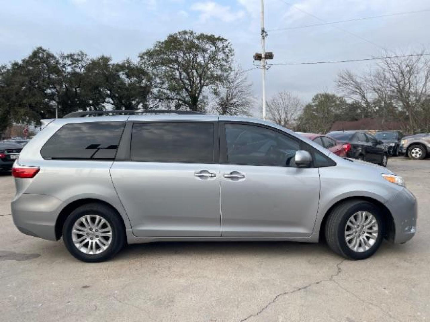 2015 Silver Sky Metallic Toyota Sienna XLE Premium Minivan 4D (5TDYK3DC1FS) with an V6, 3.5 Liter engine, Automatic, 6-Spd transmission, located at 7935 Gulf Freeway, Houston, 77017, (832) 266-1645, 29.684393, -95.275665 - Photo#7