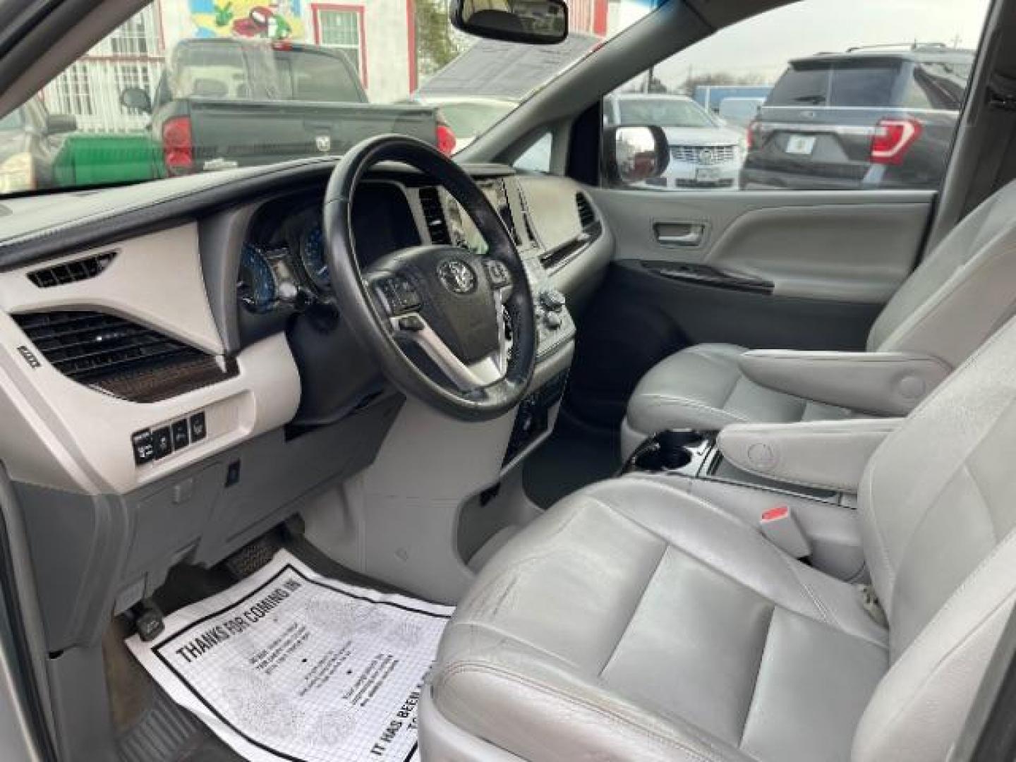 2015 Silver Sky Metallic Toyota Sienna XLE Premium Minivan 4D (5TDYK3DC1FS) with an V6, 3.5 Liter engine, Automatic, 6-Spd transmission, located at 7935 Gulf Freeway, Houston, 77017, (832) 266-1645, 29.684393, -95.275665 - Photo#8