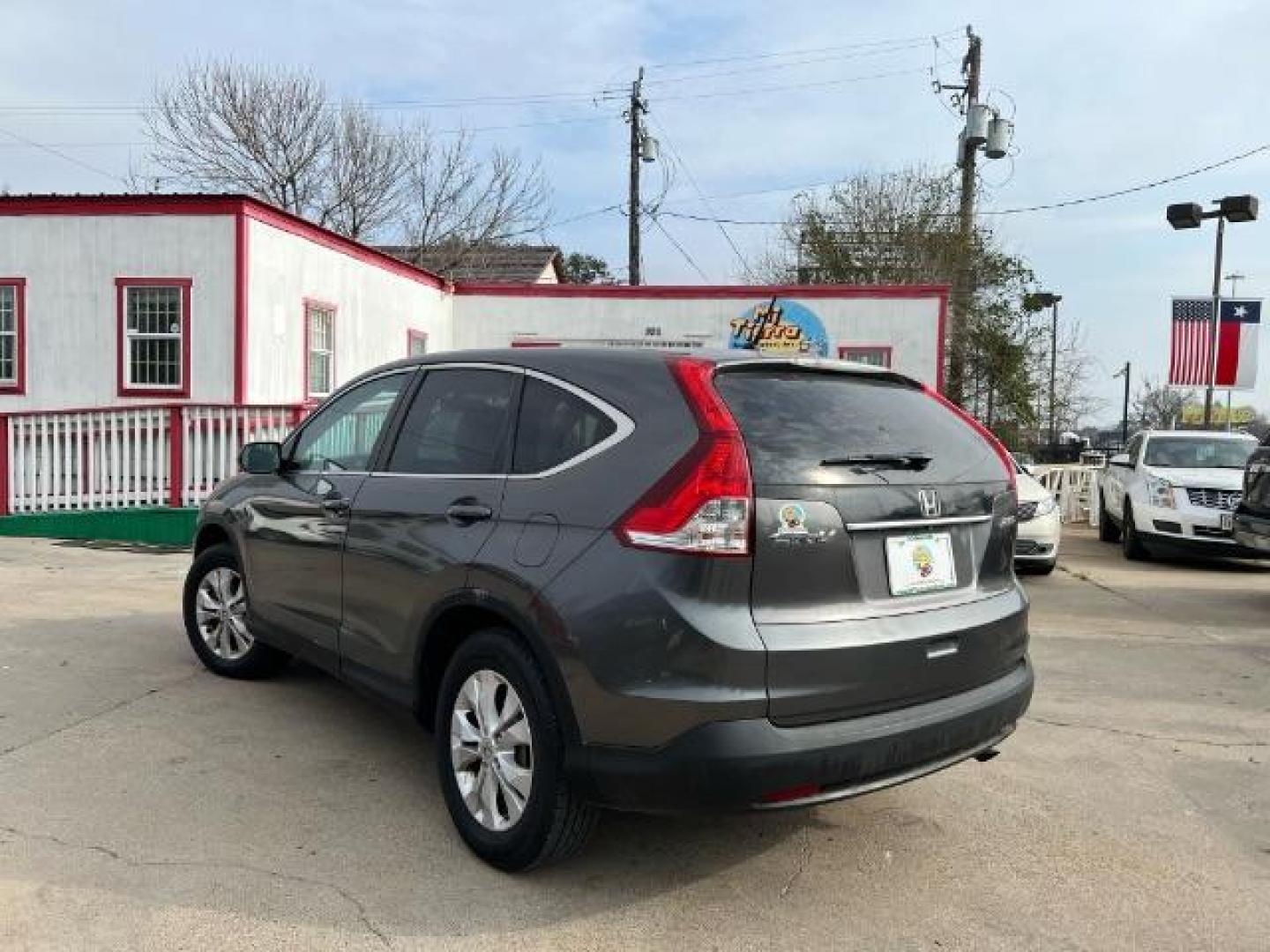 2014 Kona Coffee Metallic Honda CR-V EX 4WD 5-Speed AT (2HKRM4H54EH) with an 2.4L L4 DOHC 16V engine, 5-Speed Automatic transmission, located at 7935 Gulf Freeway, Houston, 77017, (832) 266-1645, 29.684393, -95.275665 - Photo#4