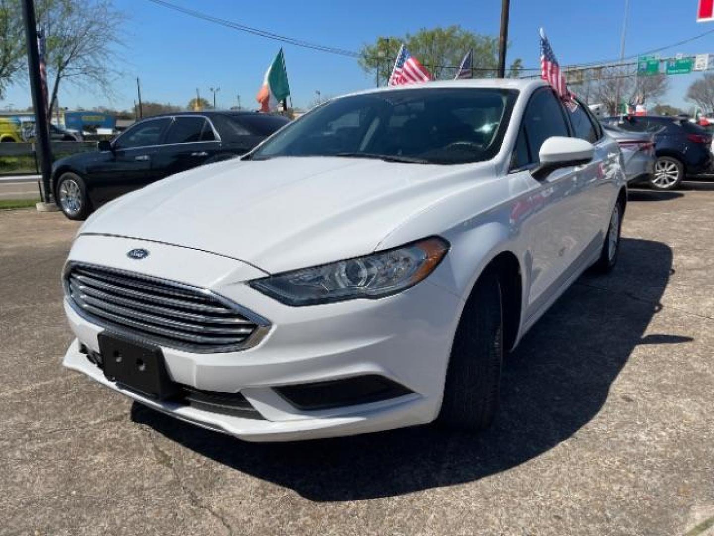 2018 Oxford White Ford Fusion S (3FA6P0G7XJR) with an Duratec 2.5L I-4 DOHC engine, AUTO. 6-SPD transmission, located at 7935 Gulf Freeway, Houston, 77017, (832) 266-1645, 29.684393, -95.275665 - Photo#2