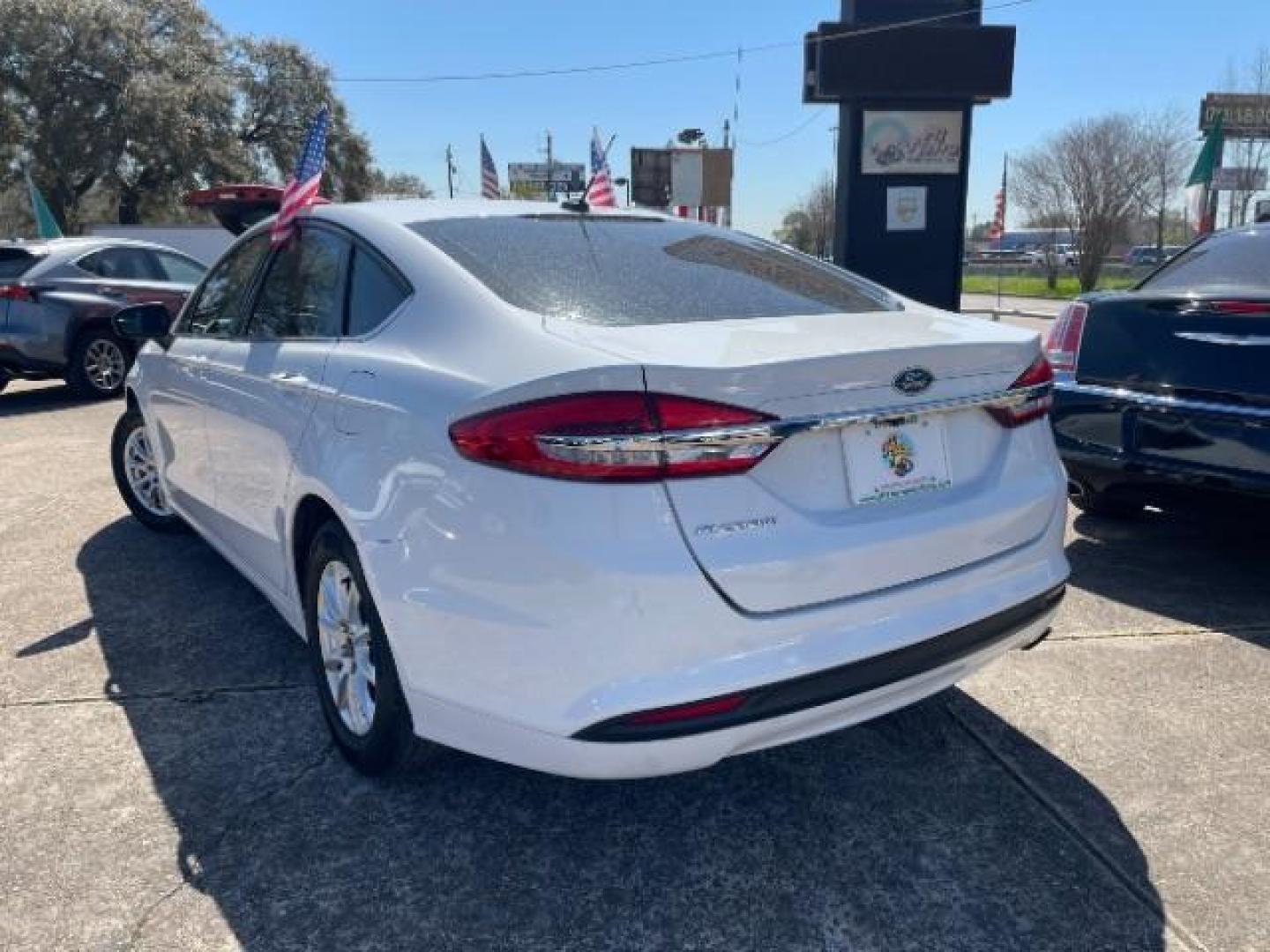 2018 Oxford White Ford Fusion S (3FA6P0G7XJR) with an Duratec 2.5L I-4 DOHC engine, AUTO. 6-SPD transmission, located at 7935 Gulf Freeway, Houston, 77017, (832) 266-1645, 29.684393, -95.275665 - Photo#4