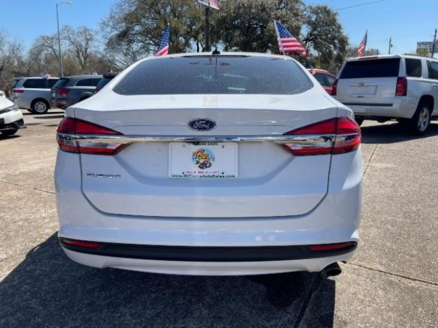 2018 Oxford White Ford Fusion S (3FA6P0G7XJR) with an Duratec 2.5L I-4 DOHC engine, AUTO. 6-SPD transmission, located at 7935 Gulf Freeway, Houston, 77017, (832) 266-1645, 29.684393, -95.275665 - Photo#5