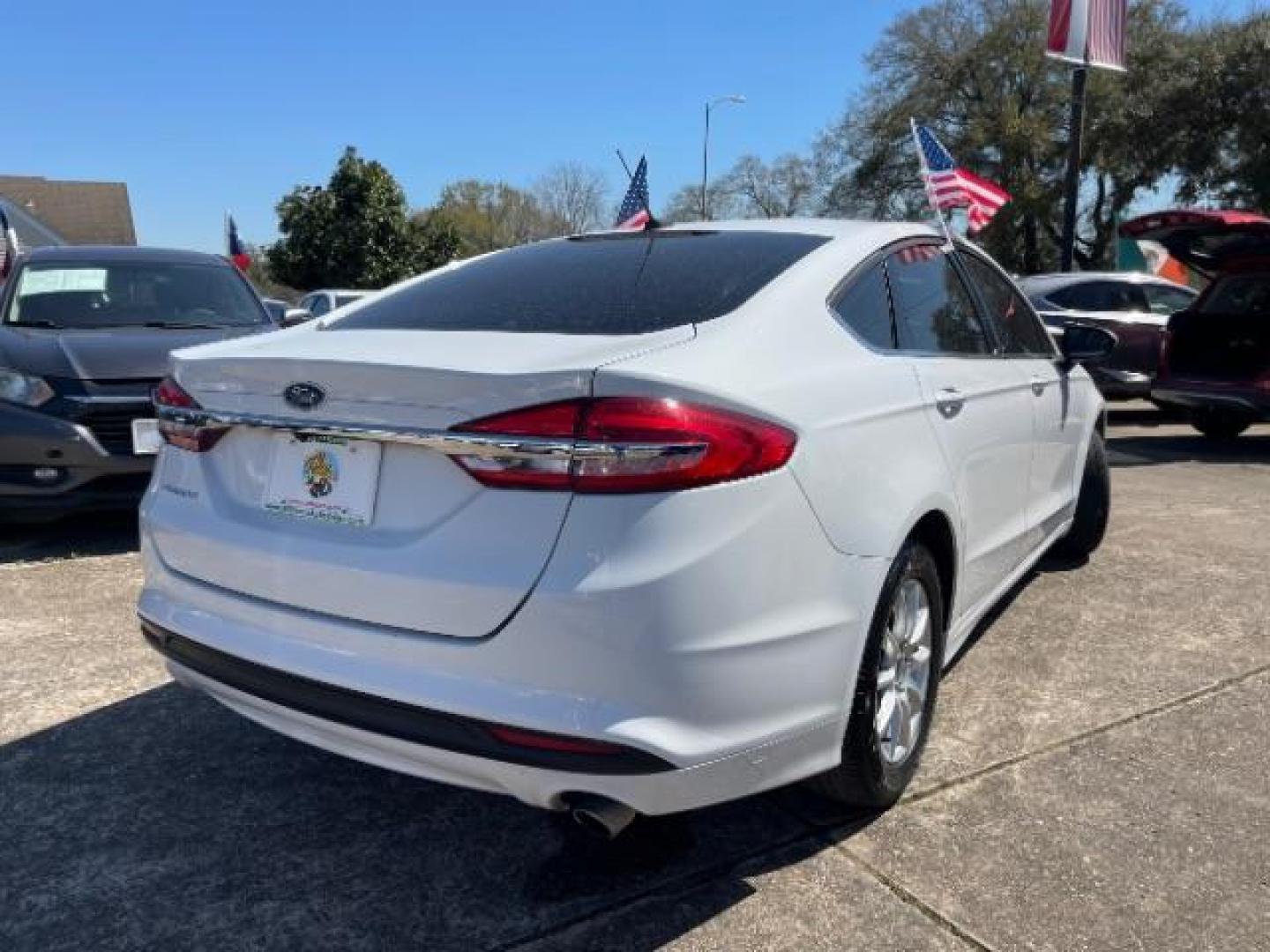 2018 Oxford White Ford Fusion S (3FA6P0G7XJR) with an Duratec 2.5L I-4 DOHC engine, AUTO. 6-SPD transmission, located at 7935 Gulf Freeway, Houston, 77017, (832) 266-1645, 29.684393, -95.275665 - Photo#6