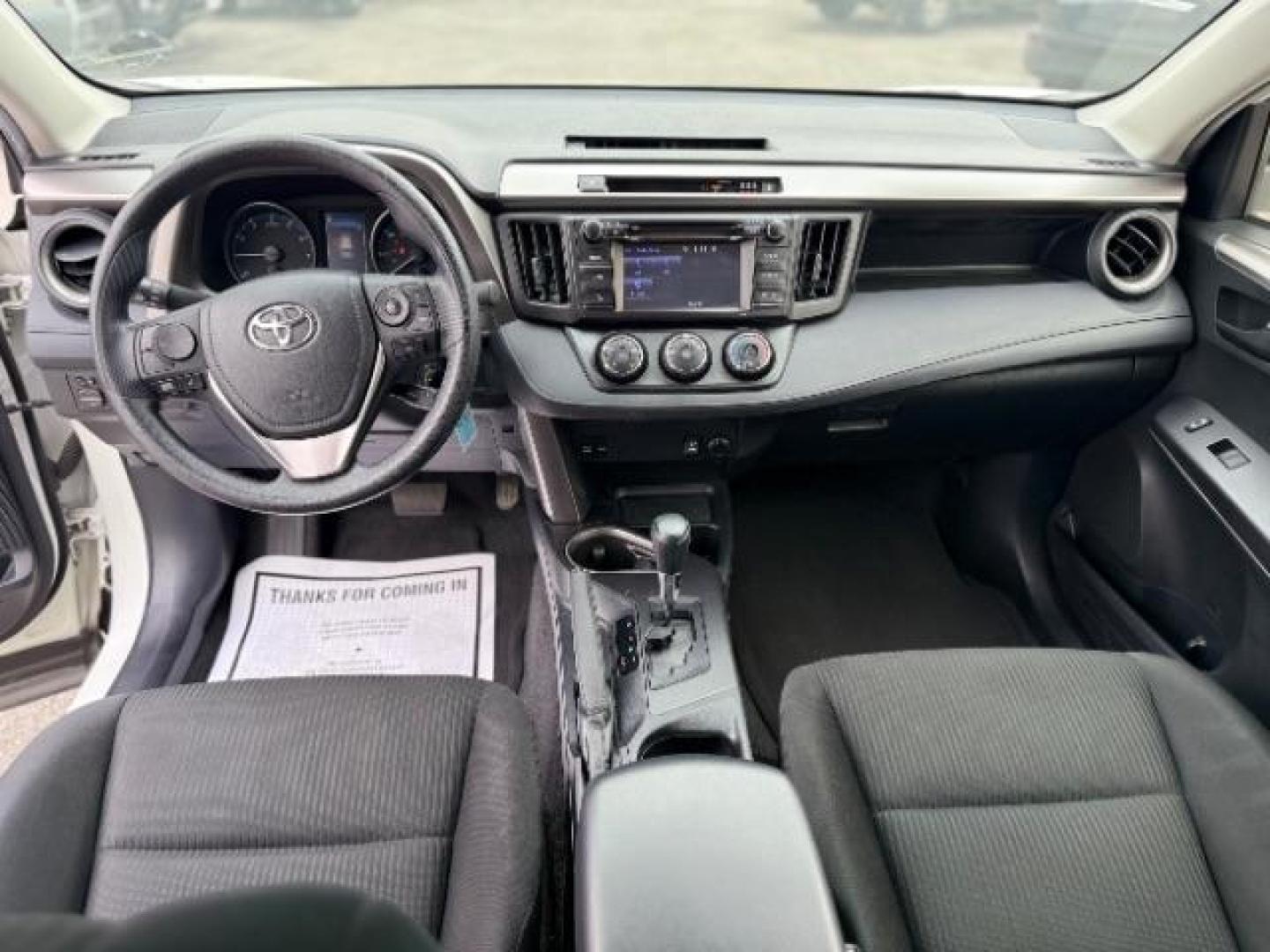2017 Super White /Black Toyota RAV4 LE (JTMZFREV7HJ) with an 2.5L I-4 DOHC engine, located at 4545 Spencer Hwy., Pasadena, 77504, (832) 266-1645, 29.666037, -95.173775 - Photo#5