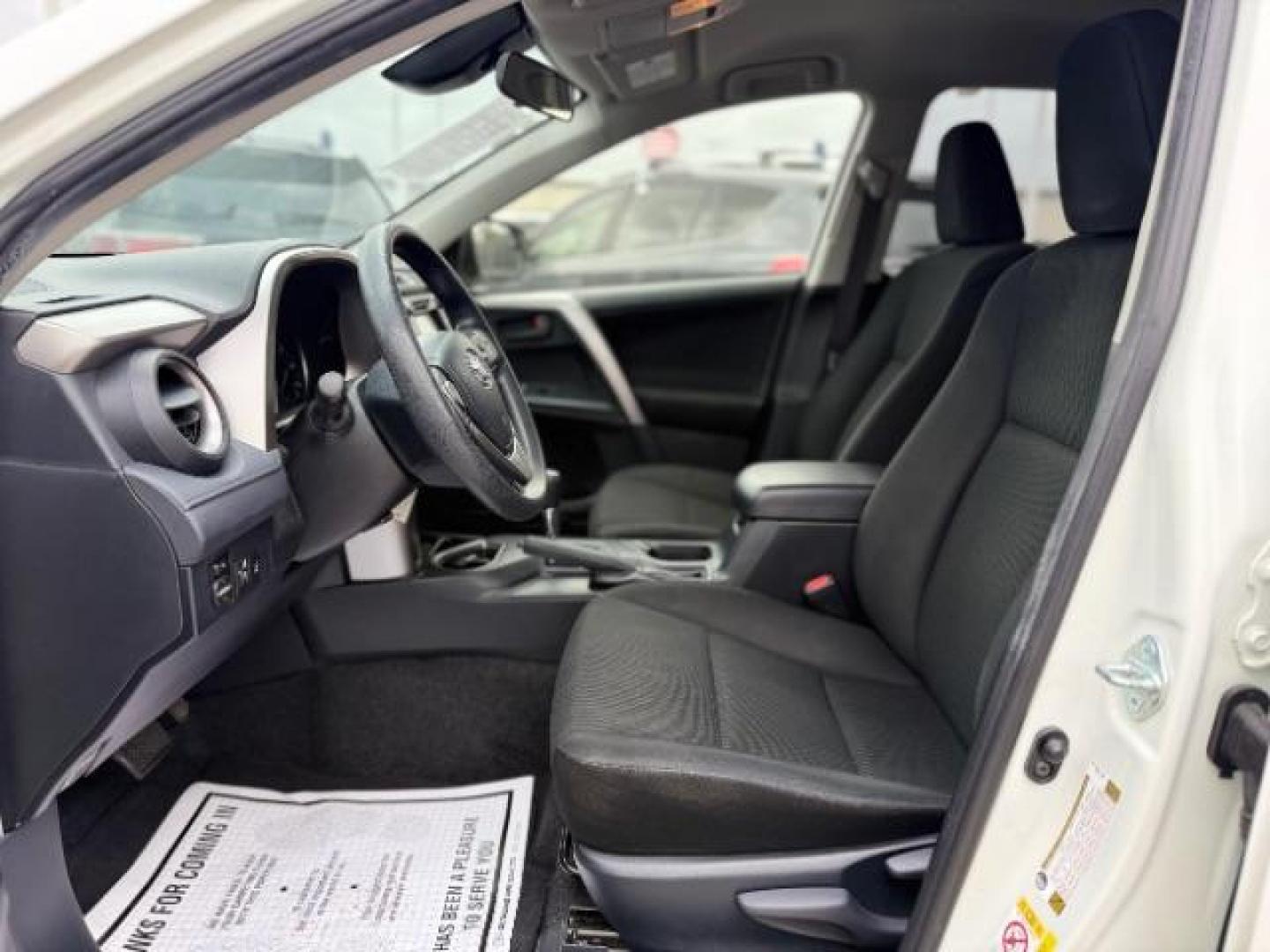 2017 Super White /Black Toyota RAV4 LE (JTMZFREV7HJ) with an 2.5L I-4 DOHC engine, located at 4545 Spencer Hwy., Pasadena, 77504, (832) 266-1645, 29.666037, -95.173775 - Photo#6