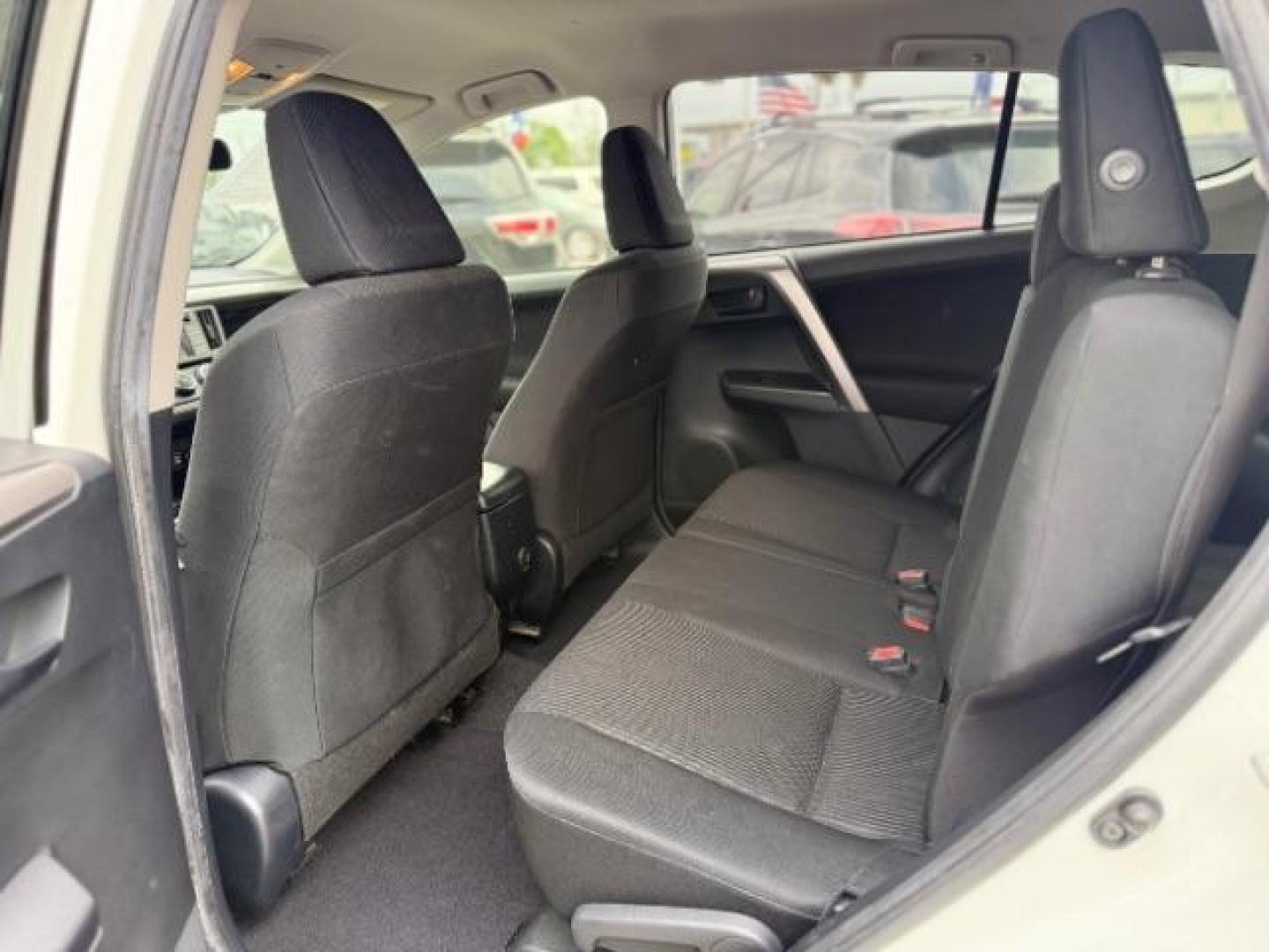 2017 Super White /Black Toyota RAV4 LE (JTMZFREV7HJ) with an 2.5L I-4 DOHC engine, located at 4545 Spencer Hwy., Pasadena, 77504, (832) 266-1645, 29.666037, -95.173775 - Photo#7