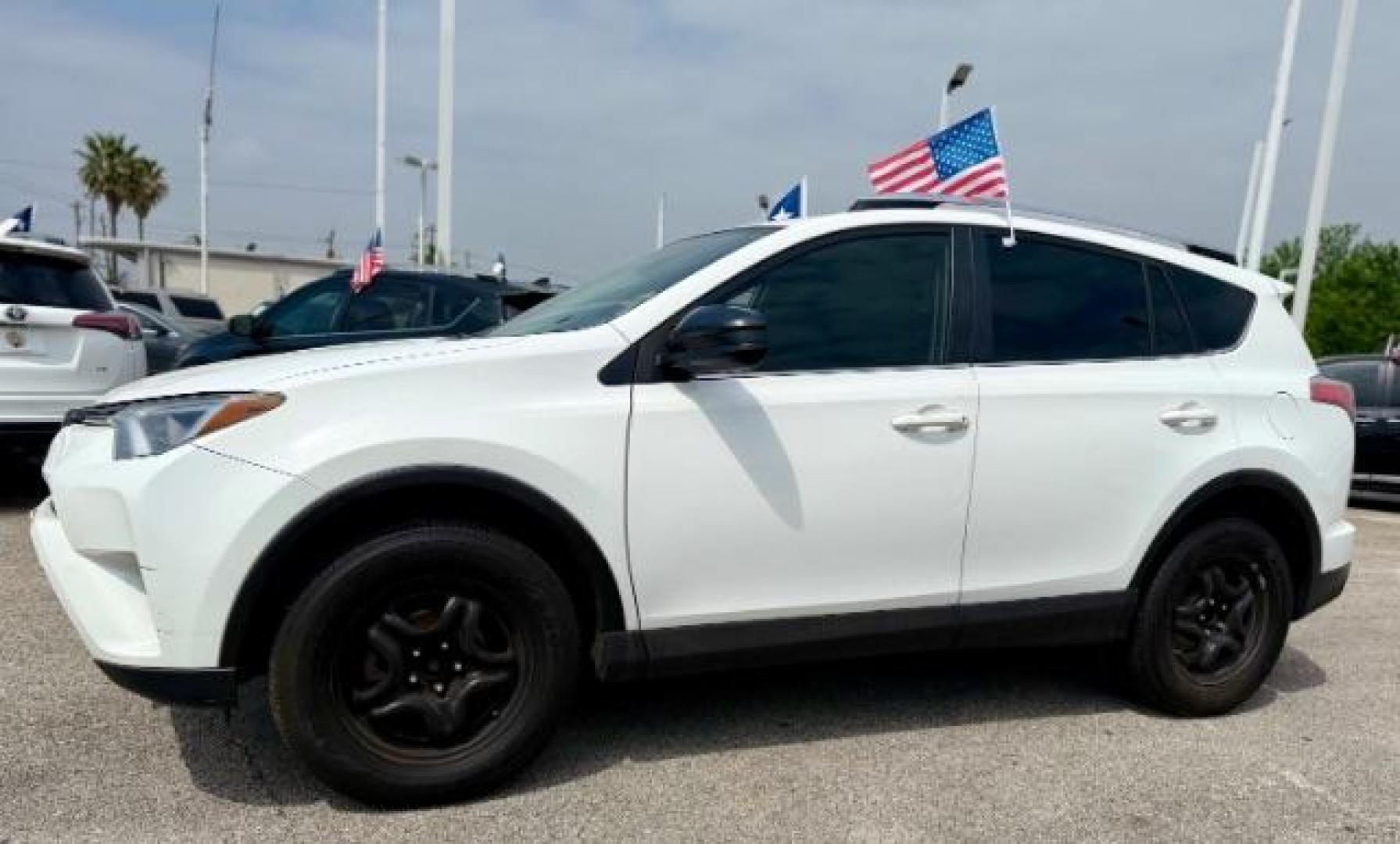 2016 Super White Toyota RAV4 LE FWD (JTMZFREV1GJ) with an 2.5L L4 DOHC 16V engine, 6-Speed Automatic transmission, located at 4545 Spencer Hwy., Pasadena, 77504, (832) 266-1645, 29.666037, -95.173775 - Photo#0