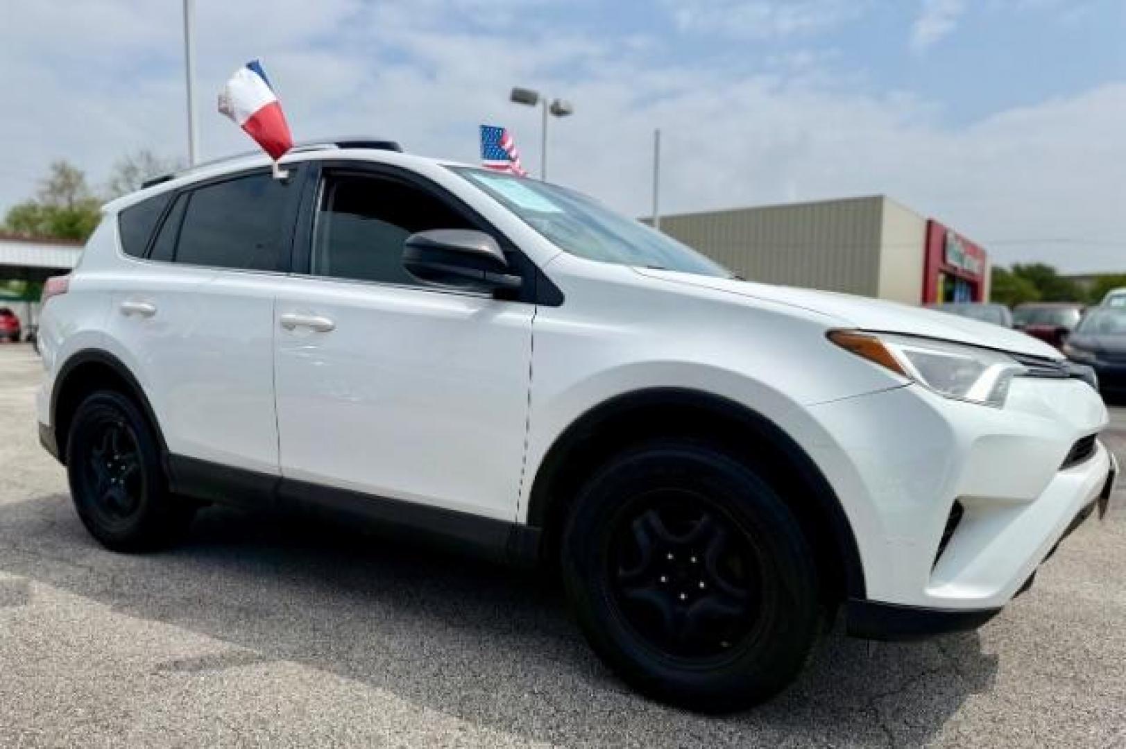 2016 Super White Toyota RAV4 LE FWD (JTMZFREV1GJ) with an 2.5L L4 DOHC 16V engine, 6-Speed Automatic transmission, located at 4545 Spencer Hwy., Pasadena, 77504, (832) 266-1645, 29.666037, -95.173775 - Photo#1