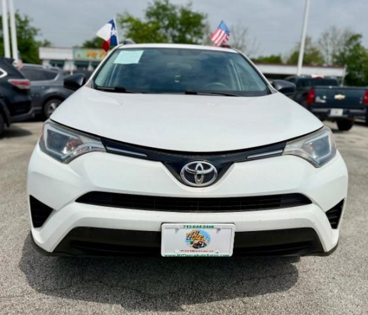 2016 Super White Toyota RAV4 LE FWD (JTMZFREV1GJ) with an 2.5L L4 DOHC 16V engine, 6-Speed Automatic transmission, located at 4545 Spencer Hwy., Pasadena, 77504, (832) 266-1645, 29.666037, -95.173775 - Photo#2