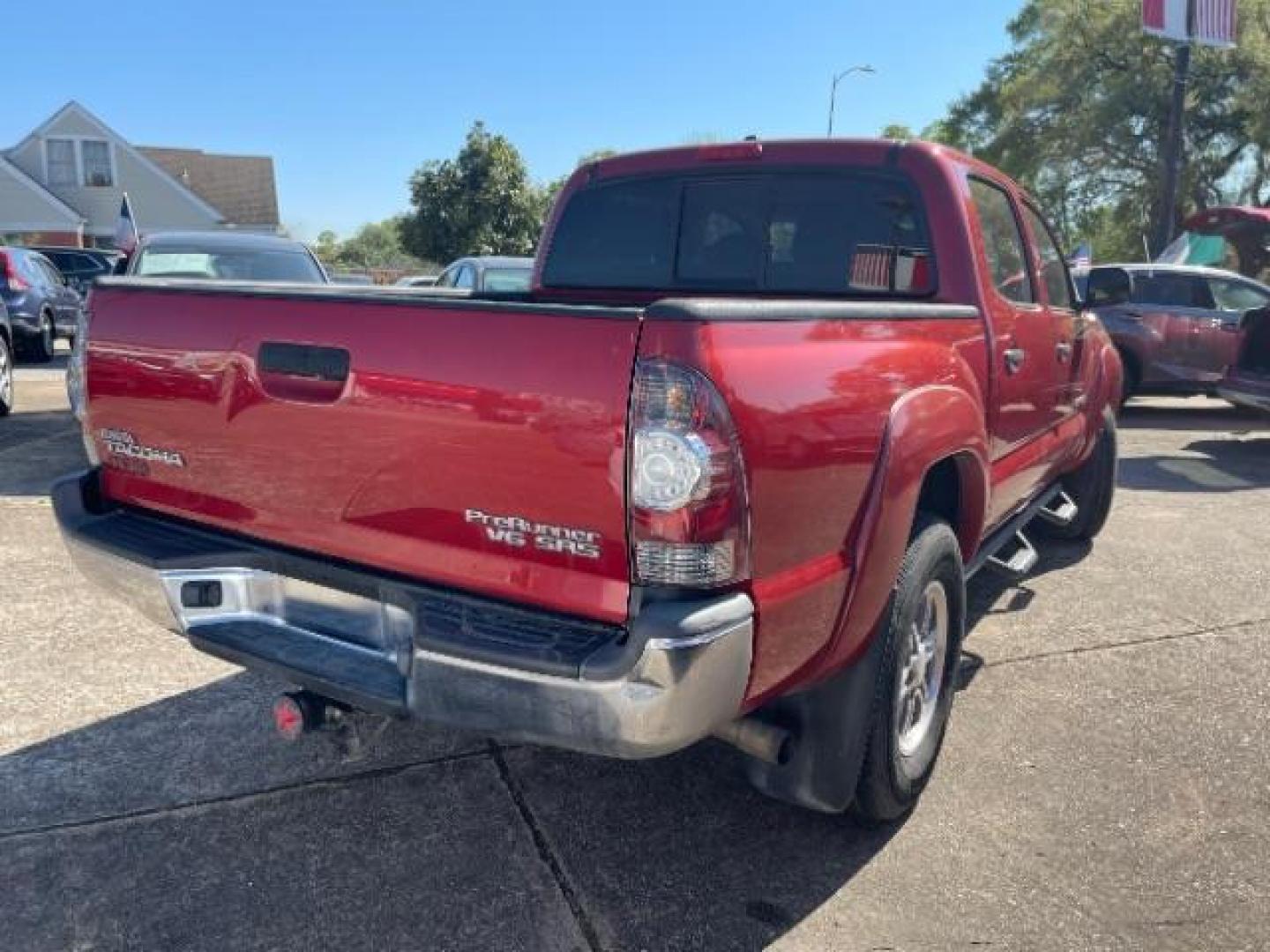 2011 Barcelona Red Metallic Toyota Tacoma PreRunner V6 (3TMJU4GNXBM) with an 4L V-6 DOHC engine, located at 7935 Gulf Freeway, Houston, 77017, (832) 266-1645, 29.684393, -95.275665 - Photo#5