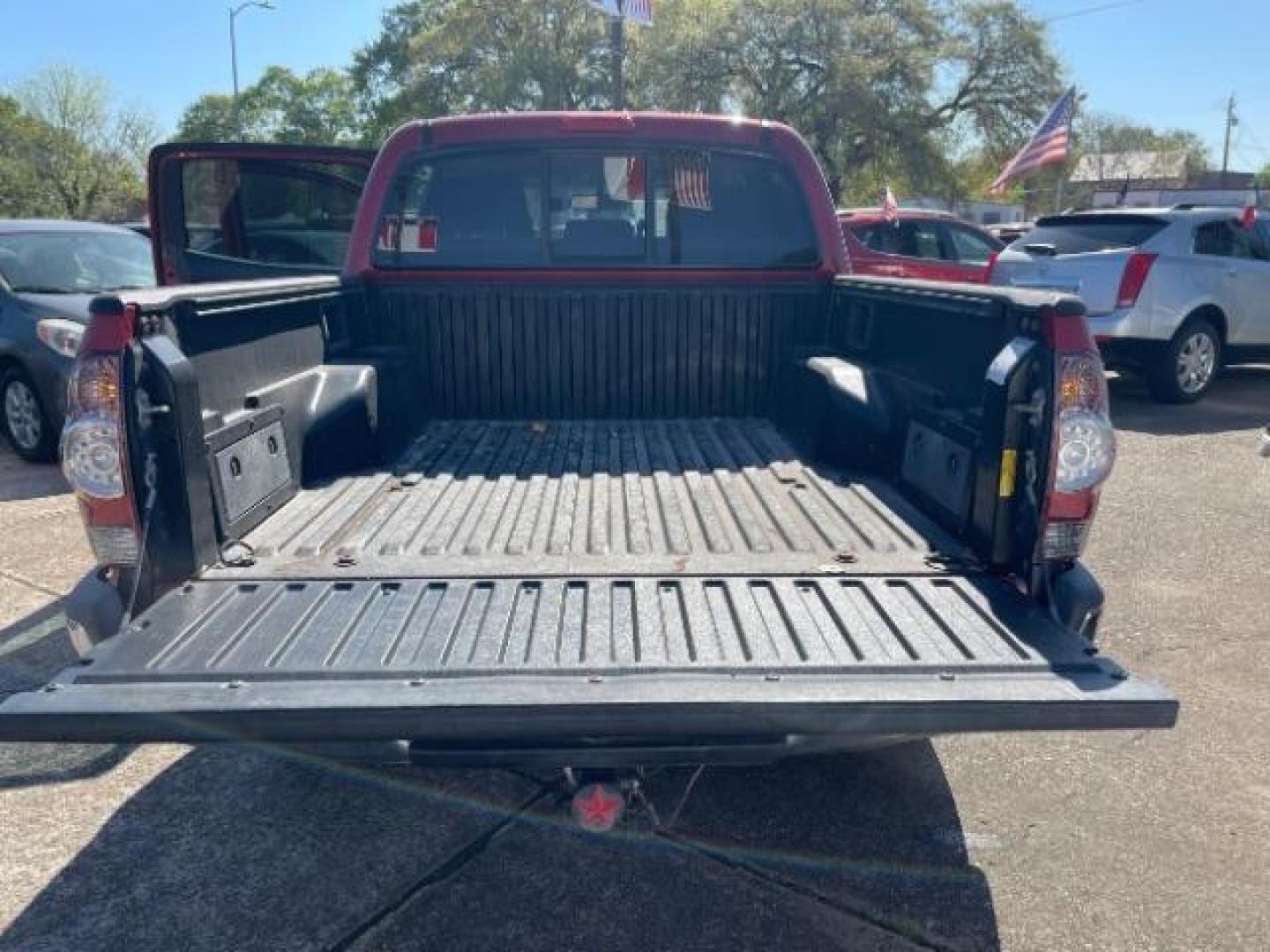 2011 Barcelona Red Metallic Toyota Tacoma PreRunner V6 (3TMJU4GNXBM) with an 4L V-6 DOHC engine, located at 7935 Gulf Freeway, Houston, 77017, (832) 266-1645, 29.684393, -95.275665 - Photo#12