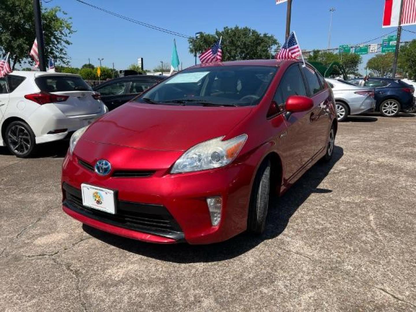 2015 Barcelona Red Metallic Toyota Prius Three (JTDKN3DU8F1) with an 1.8L I-4 DOHC engine, located at 7935 Gulf Freeway, Houston, 77017, (832) 266-1645, 29.684393, -95.275665 - Photo#2