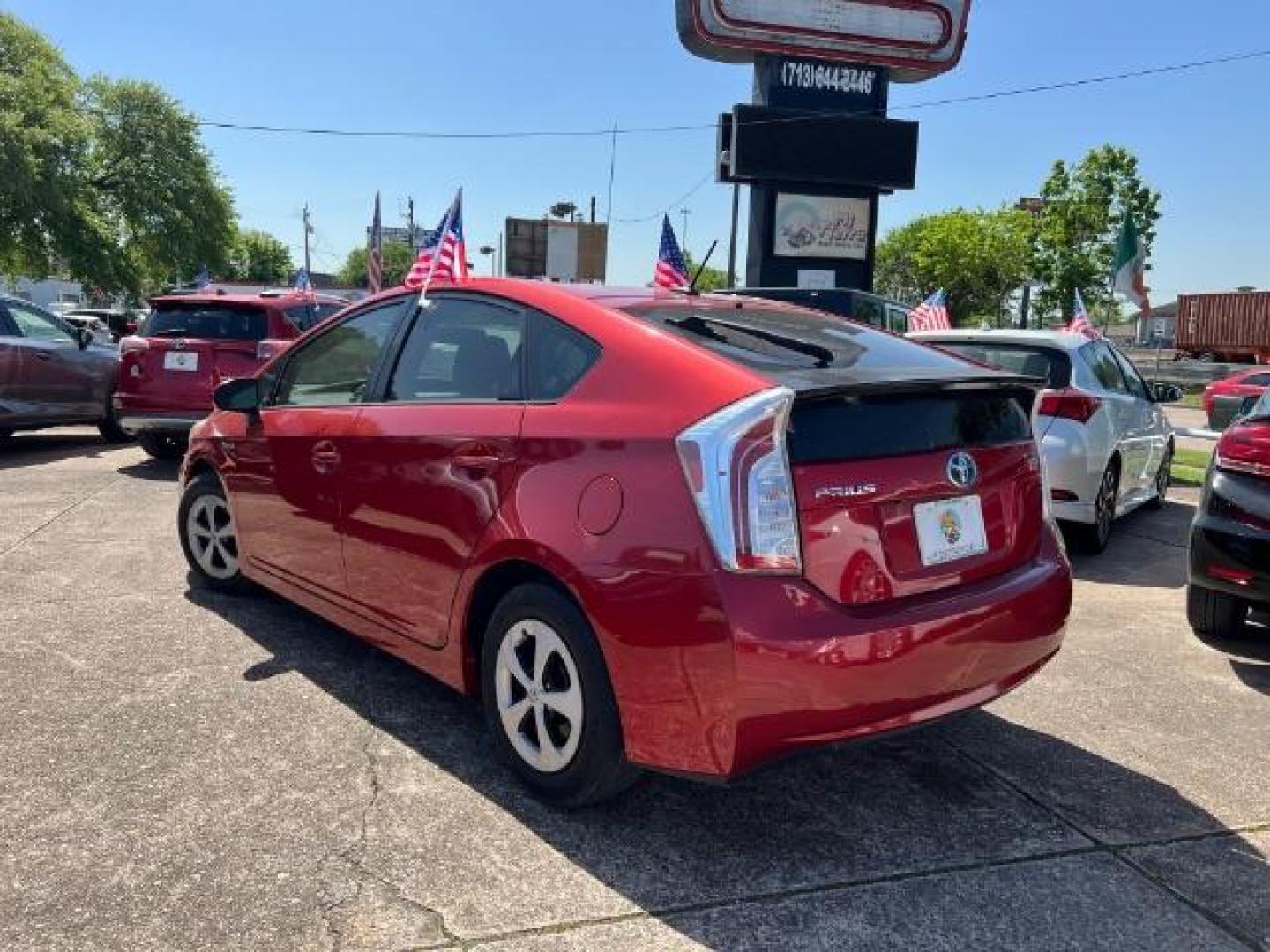 2015 Barcelona Red Metallic Toyota Prius Three (JTDKN3DU8F1) with an 1.8L I-4 DOHC engine, located at 7935 Gulf Freeway, Houston, 77017, (832) 266-1645, 29.684393, -95.275665 - Photo#4