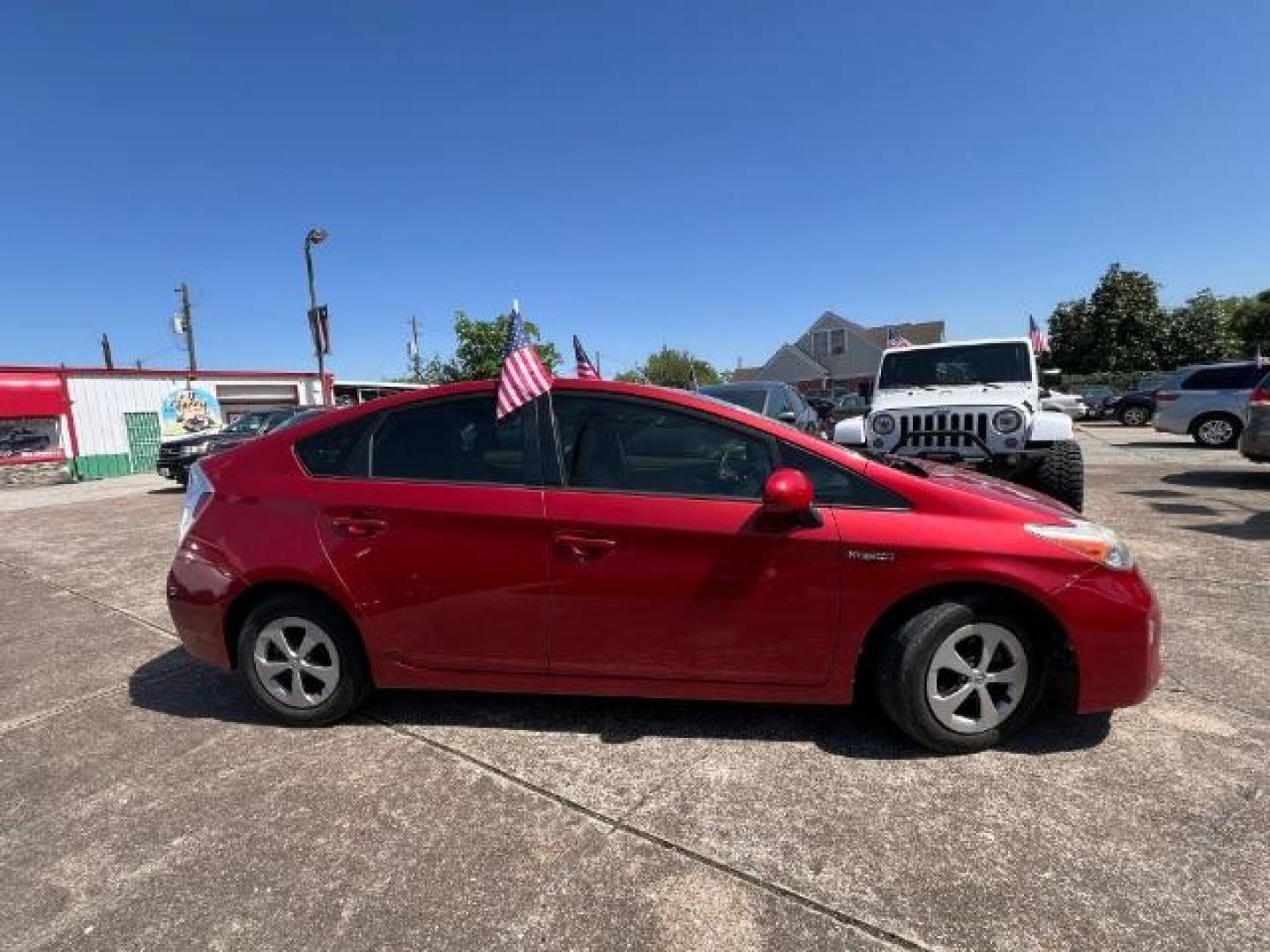 2015 Barcelona Red Metallic Toyota Prius Three (JTDKN3DU8F1) with an 1.8L I-4 DOHC engine, located at 7935 Gulf Freeway, Houston, 77017, (832) 266-1645, 29.684393, -95.275665 - Photo#7
