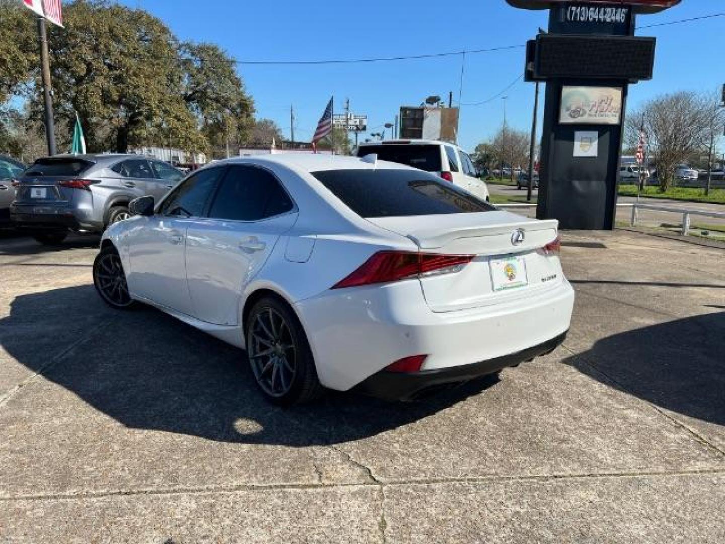 2017 Eminent White Pearl Lexus IS 200T (JTHBA1D27H5) with an 4-Cyl, Turbo, 2.0 Liter engine, Automatic, 8-Spd transmission, located at 7935 Gulf Freeway, Houston, 77017, (832) 266-1645, 29.684393, -95.275665 - Photo#4