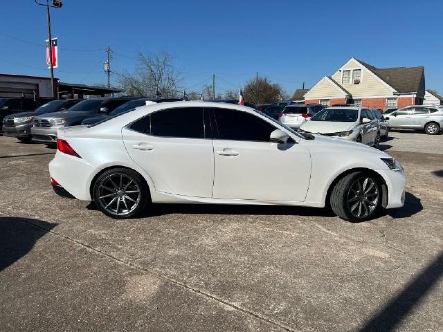 2017 Eminent White Pearl Lexus IS 200T (JTHBA1D27H5) with an 4-Cyl, Turbo, 2.0 Liter engine, Automatic, 8-Spd transmission, located at 7935 Gulf Freeway, Houston, 77017, (832) 266-1645, 29.684393, -95.275665 - Photo#7
