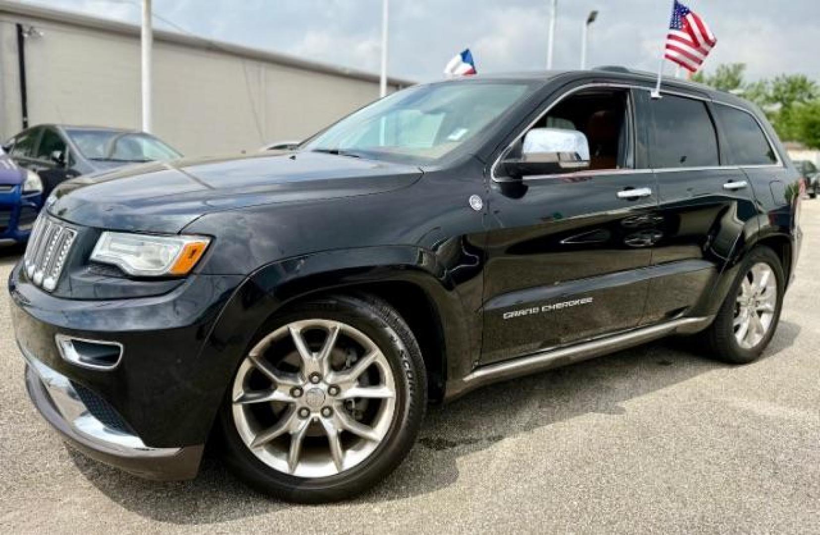 2015 Brilliant Black Crystal Pearlcoat /Black/Dark Sienna Brown Jeep Grand Cherokee Summit (1C4RJFJG4FC) with an 3.6L V-6 DOHC engine, located at 4545 Spencer Hwy., Pasadena, 77504, (832) 266-1645, 29.666037, -95.173775 - Photo#0
