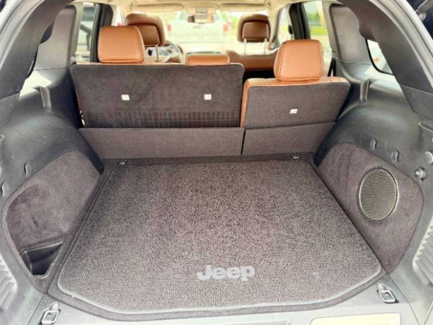 2015 Brilliant Black Crystal Pearlcoat /Black/Dark Sienna Brown Jeep Grand Cherokee Summit (1C4RJFJG4FC) with an 3.6L V-6 DOHC engine, located at 4545 Spencer Hwy., Pasadena, 77504, (832) 266-1645, 29.666037, -95.173775 - Photo#10