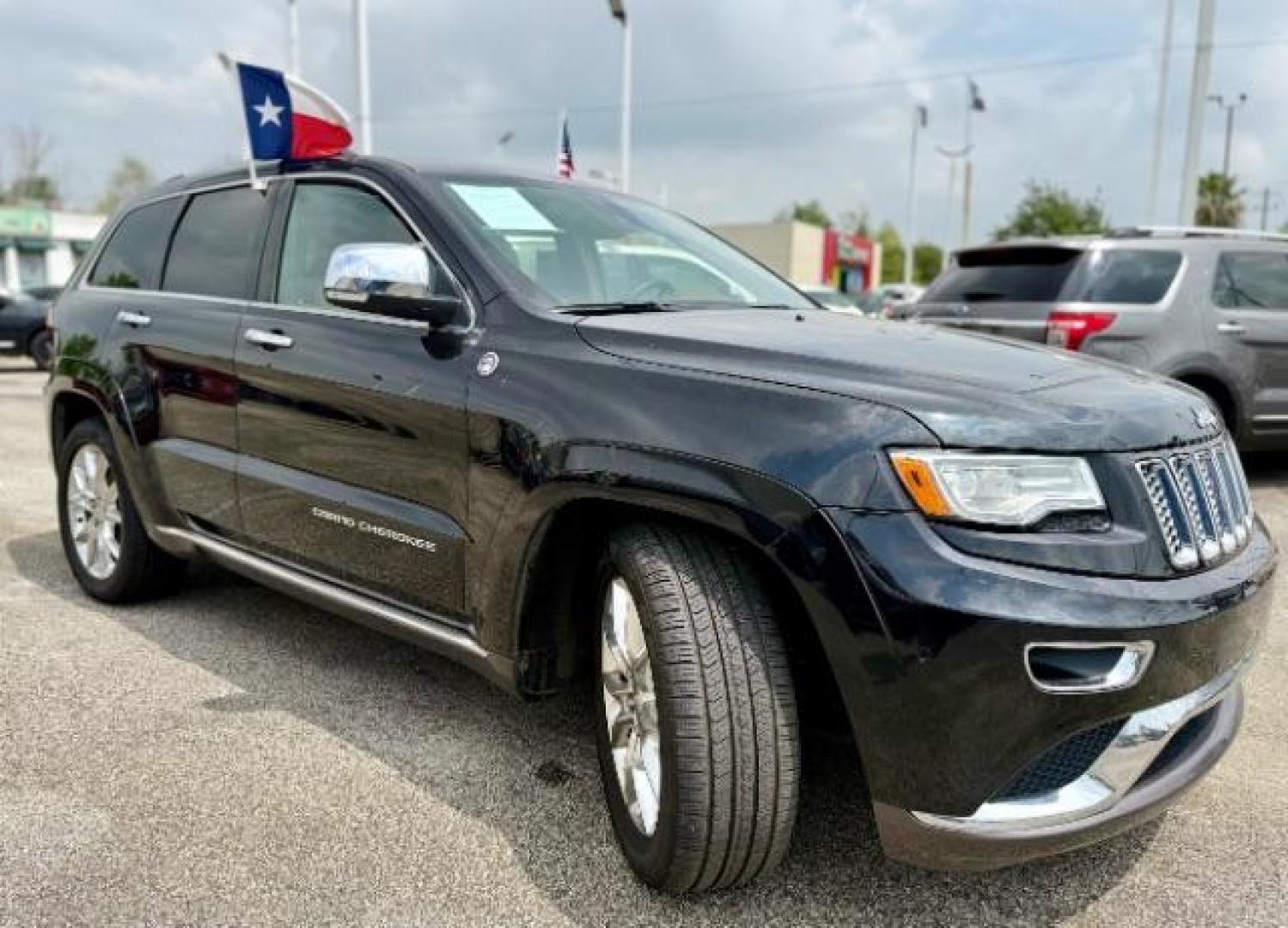 2015 Brilliant Black Crystal Pearlcoat /Black/Dark Sienna Brown Jeep Grand Cherokee Summit (1C4RJFJG4FC) with an 3.6L V-6 DOHC engine, located at 4545 Spencer Hwy., Pasadena, 77504, (832) 266-1645, 29.666037, -95.173775 - Photo#3