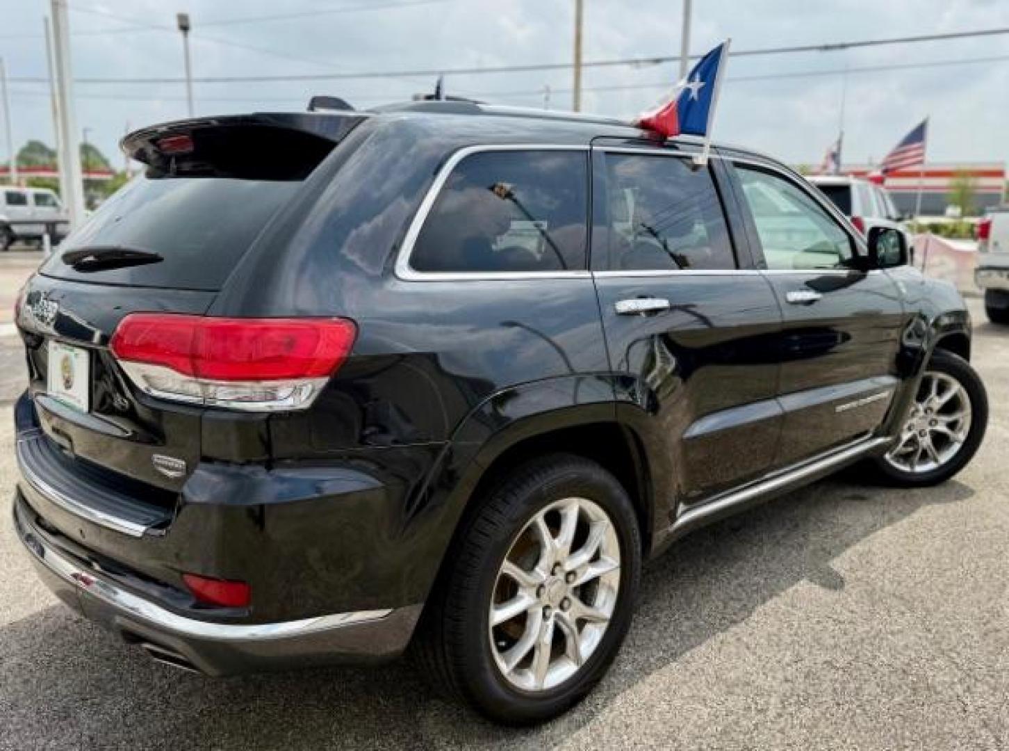 2015 Brilliant Black Crystal Pearlcoat /Black/Dark Sienna Brown Jeep Grand Cherokee Summit (1C4RJFJG4FC) with an 3.6L V-6 DOHC engine, located at 4545 Spencer Hwy., Pasadena, 77504, (832) 266-1645, 29.666037, -95.173775 - Photo#4