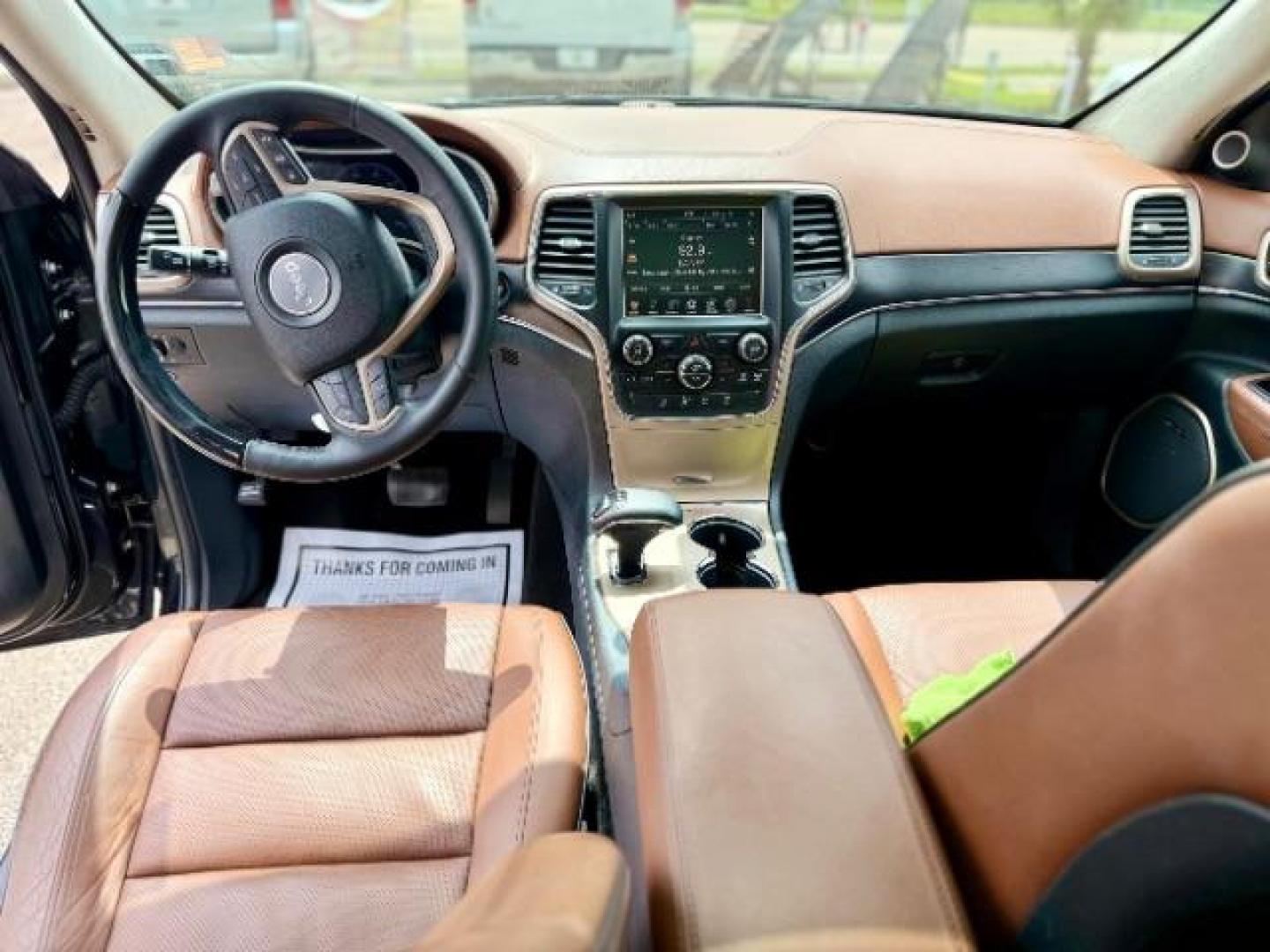 2015 Brilliant Black Crystal Pearlcoat /Black/Dark Sienna Brown Jeep Grand Cherokee Summit (1C4RJFJG4FC) with an 3.6L V-6 DOHC engine, located at 4545 Spencer Hwy., Pasadena, 77504, (832) 266-1645, 29.666037, -95.173775 - Photo#6