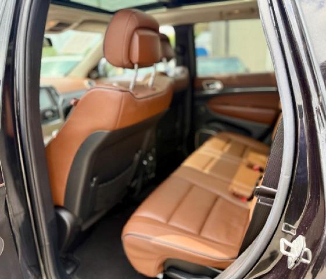 2015 Brilliant Black Crystal Pearlcoat /Black/Dark Sienna Brown Jeep Grand Cherokee Summit (1C4RJFJG4FC) with an 3.6L V-6 DOHC engine, located at 4545 Spencer Hwy., Pasadena, 77504, (832) 266-1645, 29.666037, -95.173775 - Photo#8