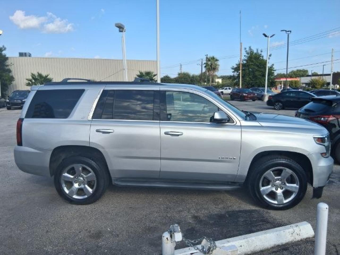 2015 Silver Ice Metallic /Jet Black Chevrolet Tahoe LT (1GNSKBKC9FR) with an EcoTec3 5.3L V-8 gas engine, located at 4545 Spencer Hwy., Pasadena, 77504, (832) 266-1645, 29.666037, -95.173775- Photo#2