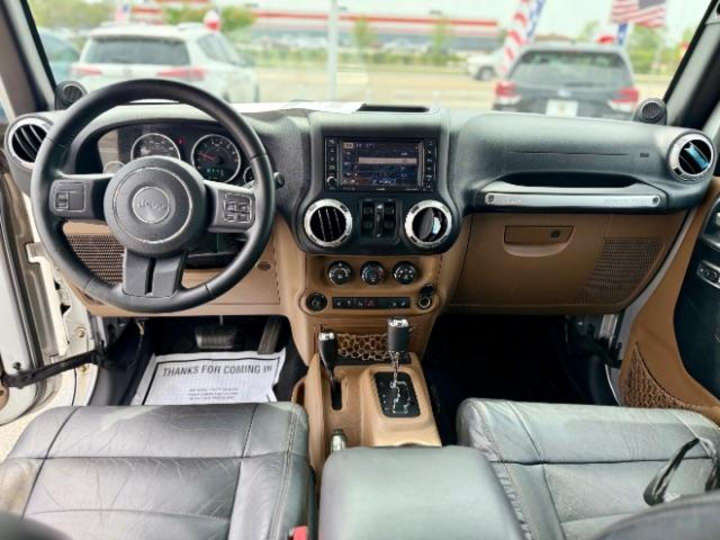 2012 Bright Silver Metallic Clearcoat /Dark Saddle/Black Jeep Wrangler Unlimited Sahara (1C4BJWEG5CL) with an 3.6L V-6 DOHC engine, located at 4545 Spencer Hwy., Pasadena, 77504, (832) 266-1645, 29.666037, -95.173775 - Photo#4