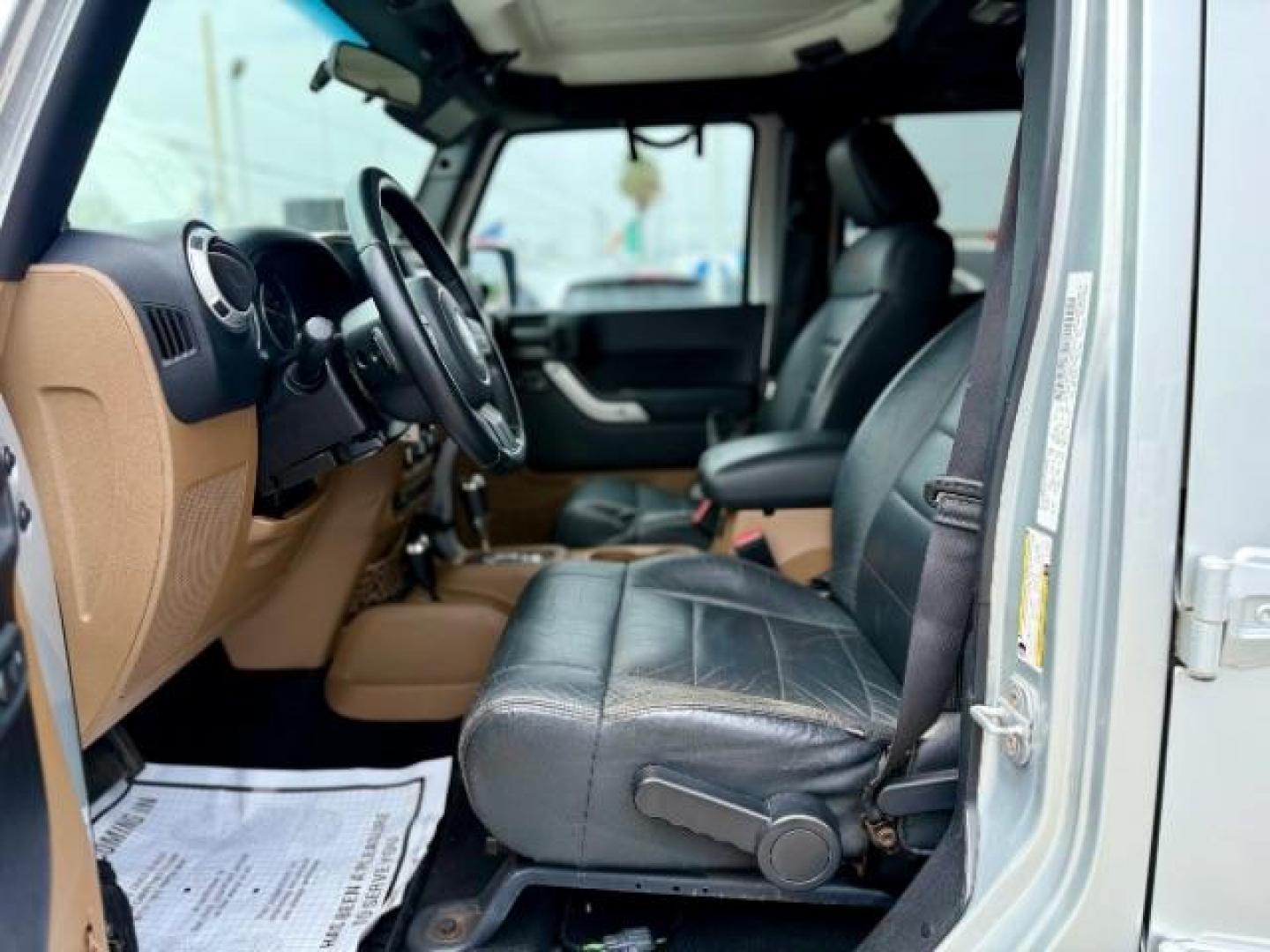 2012 Bright Silver Metallic Clearcoat /Dark Saddle/Black Jeep Wrangler Unlimited Sahara (1C4BJWEG5CL) with an 3.6L V-6 DOHC engine, located at 4545 Spencer Hwy., Pasadena, 77504, (832) 266-1645, 29.666037, -95.173775 - Photo#5