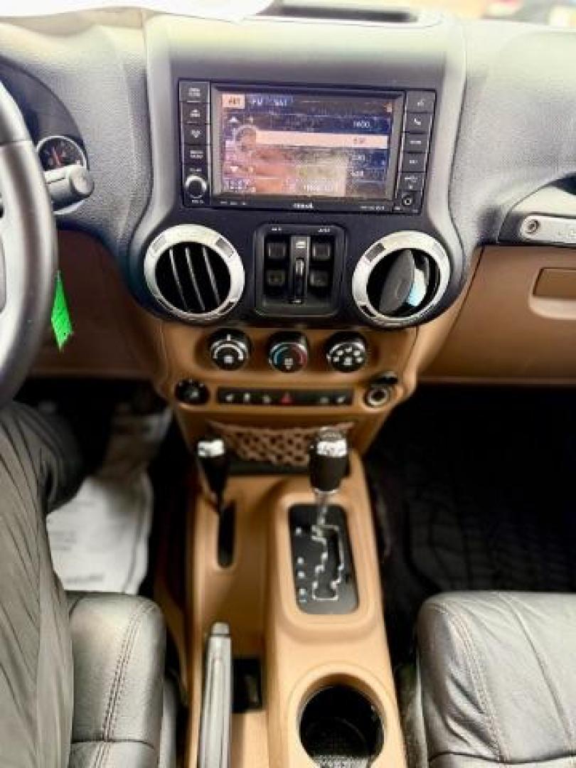 2012 Bright Silver Metallic Clearcoat /Dark Saddle/Black Jeep Wrangler Unlimited Sahara (1C4BJWEG5CL) with an 3.6L V-6 DOHC engine, located at 4545 Spencer Hwy., Pasadena, 77504, (832) 266-1645, 29.666037, -95.173775 - Photo#7