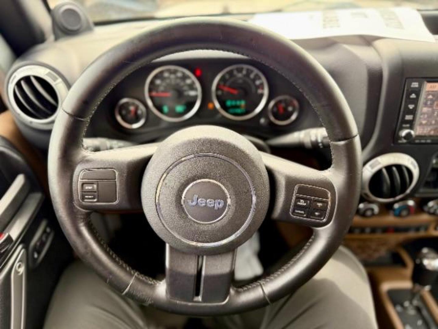2012 Bright Silver Metallic Clearcoat /Dark Saddle/Black Jeep Wrangler Unlimited Sahara (1C4BJWEG5CL) with an 3.6L V-6 DOHC engine, located at 4545 Spencer Hwy., Pasadena, 77504, (832) 266-1645, 29.666037, -95.173775 - Photo#8