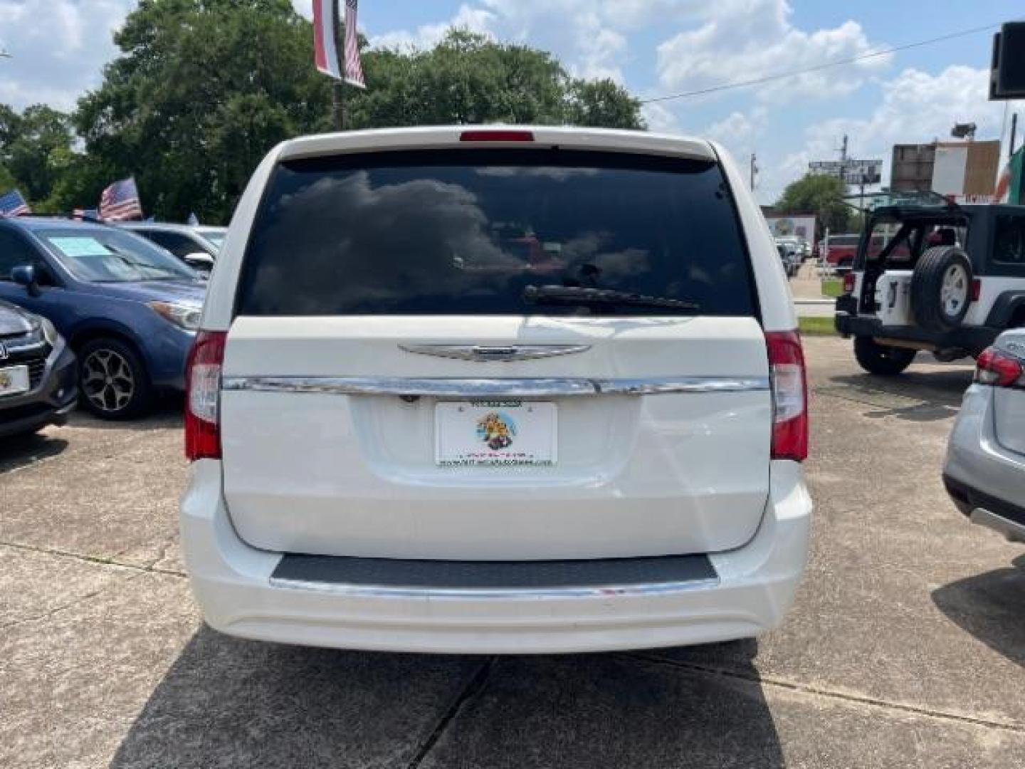 2013 Stone White Clearcoat Chrysler Town and Country Touring (2C4RC1BG5DR) with an Pentastar 3.6L V-6 DOHC engine, located at 7935 Gulf Freeway, Houston, 77017, (832) 266-1645, 29.684393, -95.275665 - Photo#5