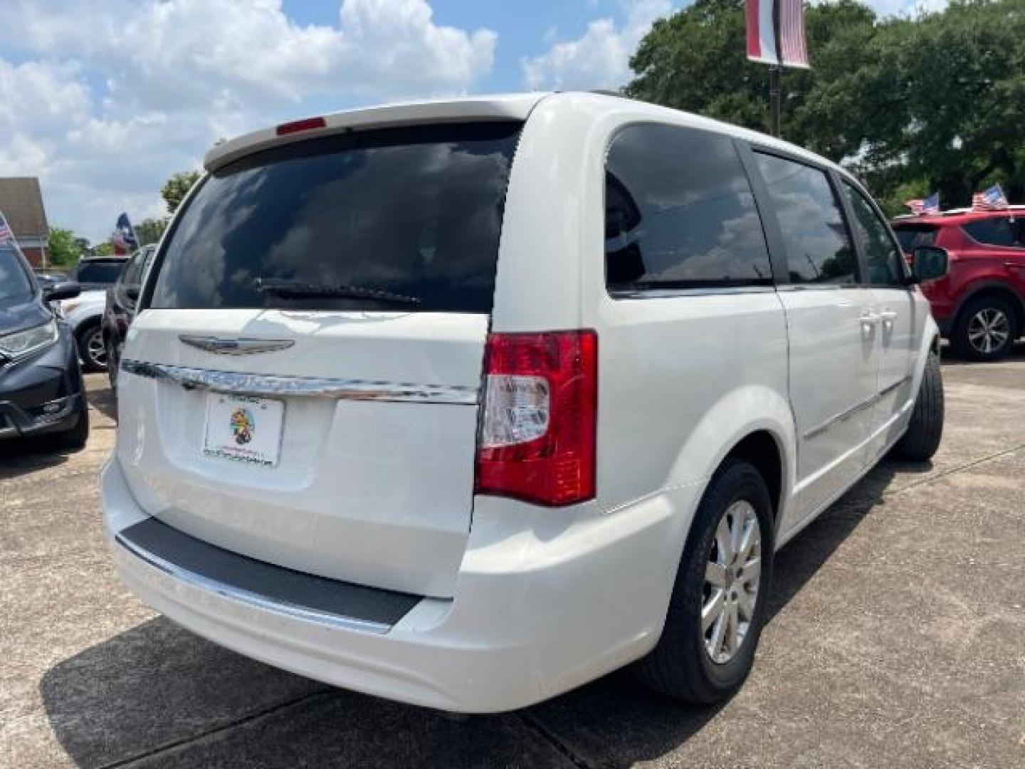 2013 Stone White Clearcoat Chrysler Town and Country Touring (2C4RC1BG5DR) with an Pentastar 3.6L V-6 DOHC engine, located at 7935 Gulf Freeway, Houston, 77017, (832) 266-1645, 29.684393, -95.275665 - Photo#6