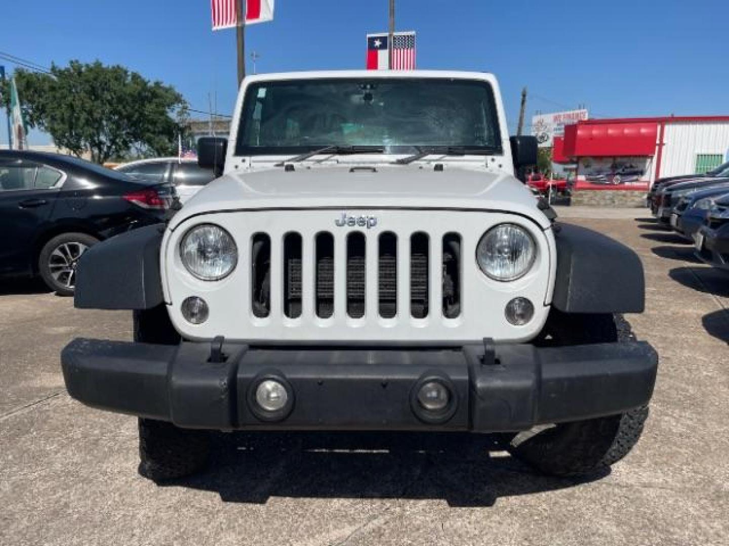 2016 Bright White Clearcoat Jeep Wrangler Unlimited Sport RHD (1C4BJWKG4GL) with an Pentastar 3.6L V-6 DOHC engine, located at 7935 Gulf Freeway, Houston, 77017, (832) 266-1645, 29.684393, -95.275665 - Photo#1