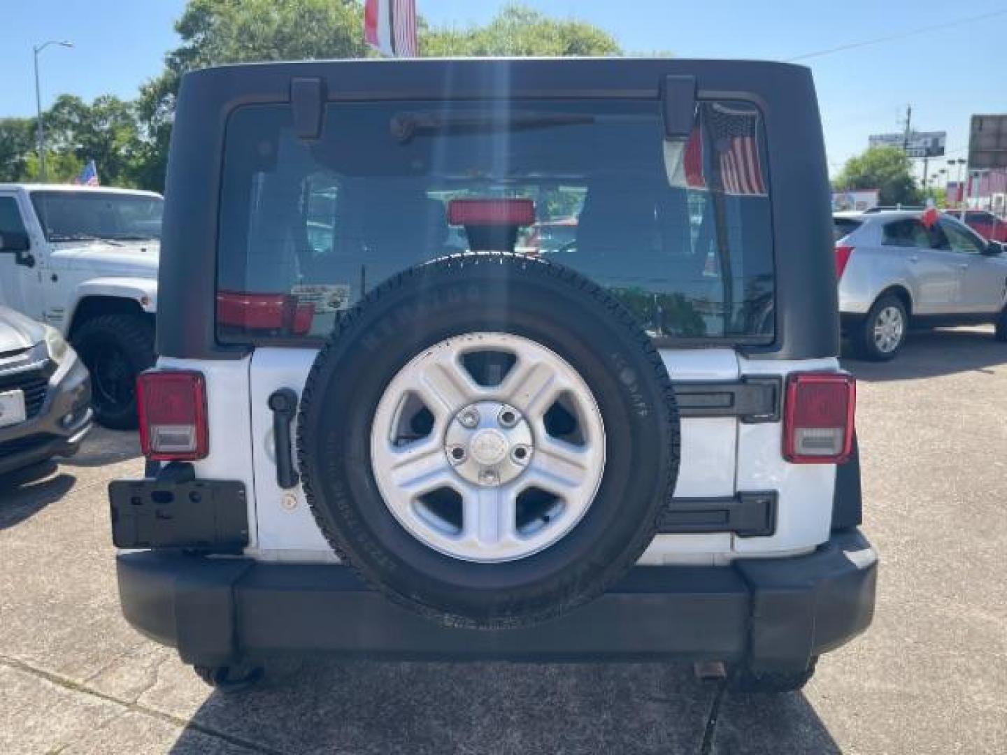 2016 Bright White Clearcoat Jeep Wrangler Unlimited Sport RHD (1C4BJWKG4GL) with an Pentastar 3.6L V-6 DOHC engine, located at 7935 Gulf Freeway, Houston, 77017, (832) 266-1645, 29.684393, -95.275665 - Photo#5