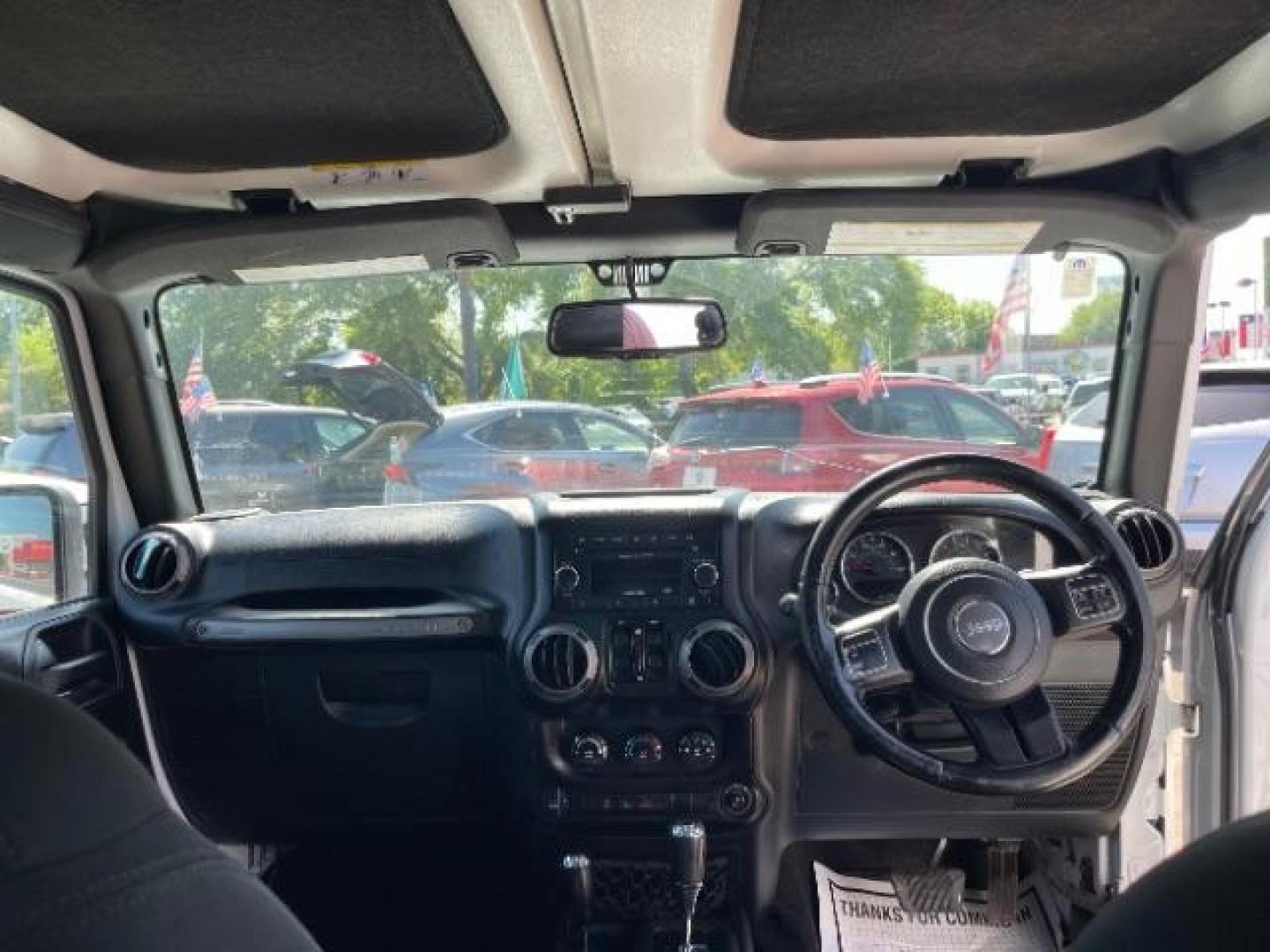 2016 Bright White Clearcoat Jeep Wrangler Unlimited Sport RHD (1C4BJWKG4GL) with an Pentastar 3.6L V-6 DOHC engine, located at 7935 Gulf Freeway, Houston, 77017, (832) 266-1645, 29.684393, -95.275665 - Photo#10