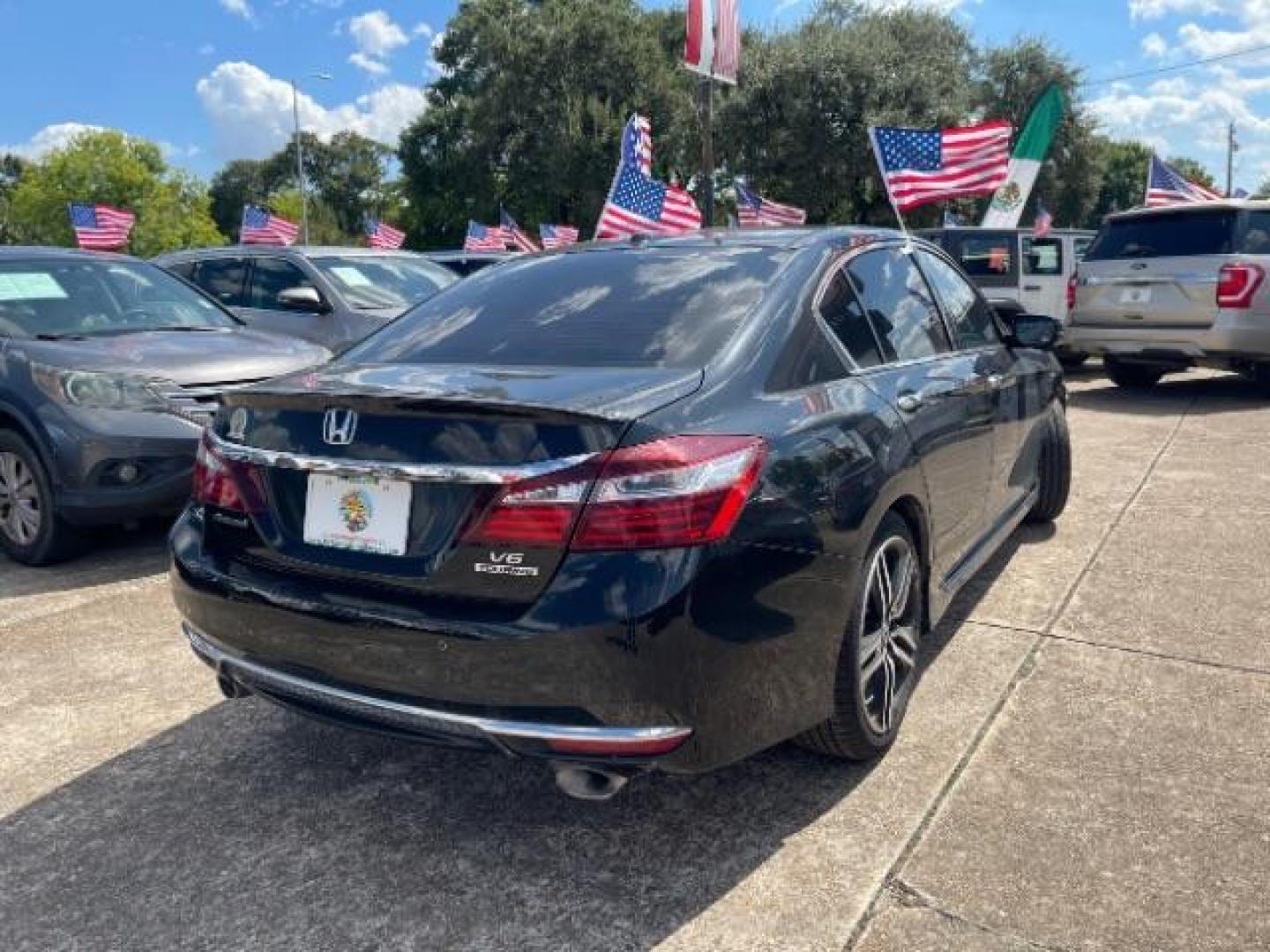 2016 Crystal Black Pearl /Black Honda Accord Touring (1HGCR3F97GA) with an 3.5L V-6 i-VTEC variable valve control engine, located at 7935 Gulf Freeway, Houston, 77017, (832) 266-1645, 29.684393, -95.275665 - Photo#3