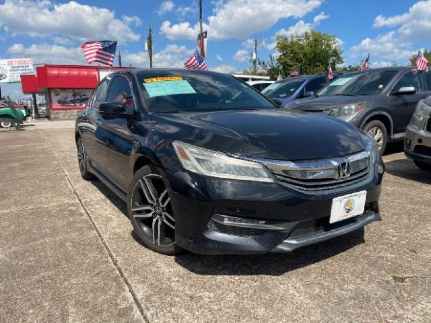 2016 Crystal Black Pearl /Black Honda Accord Touring (1HGCR3F97GA) with an 3.5L V-6 i-VTEC variable valve control engine, located at 7935 Gulf Freeway, Houston, 77017, (832) 266-1645, 29.684393, -95.275665 - Photo#4