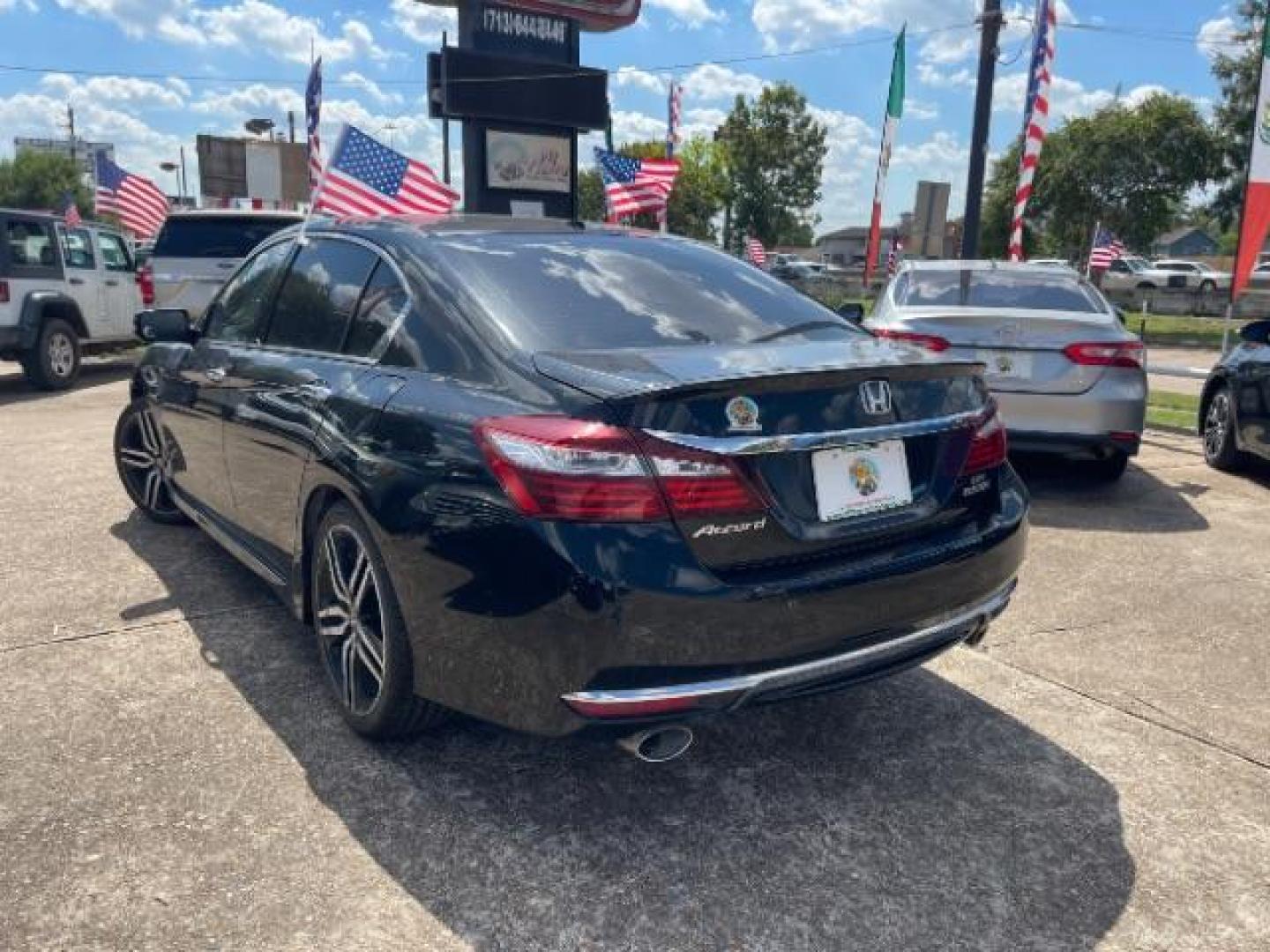 2016 Crystal Black Pearl /Black Honda Accord Touring (1HGCR3F97GA) with an 3.5L V-6 i-VTEC variable valve control engine, located at 7935 Gulf Freeway, Houston, 77017, (832) 266-1645, 29.684393, -95.275665 - Photo#6